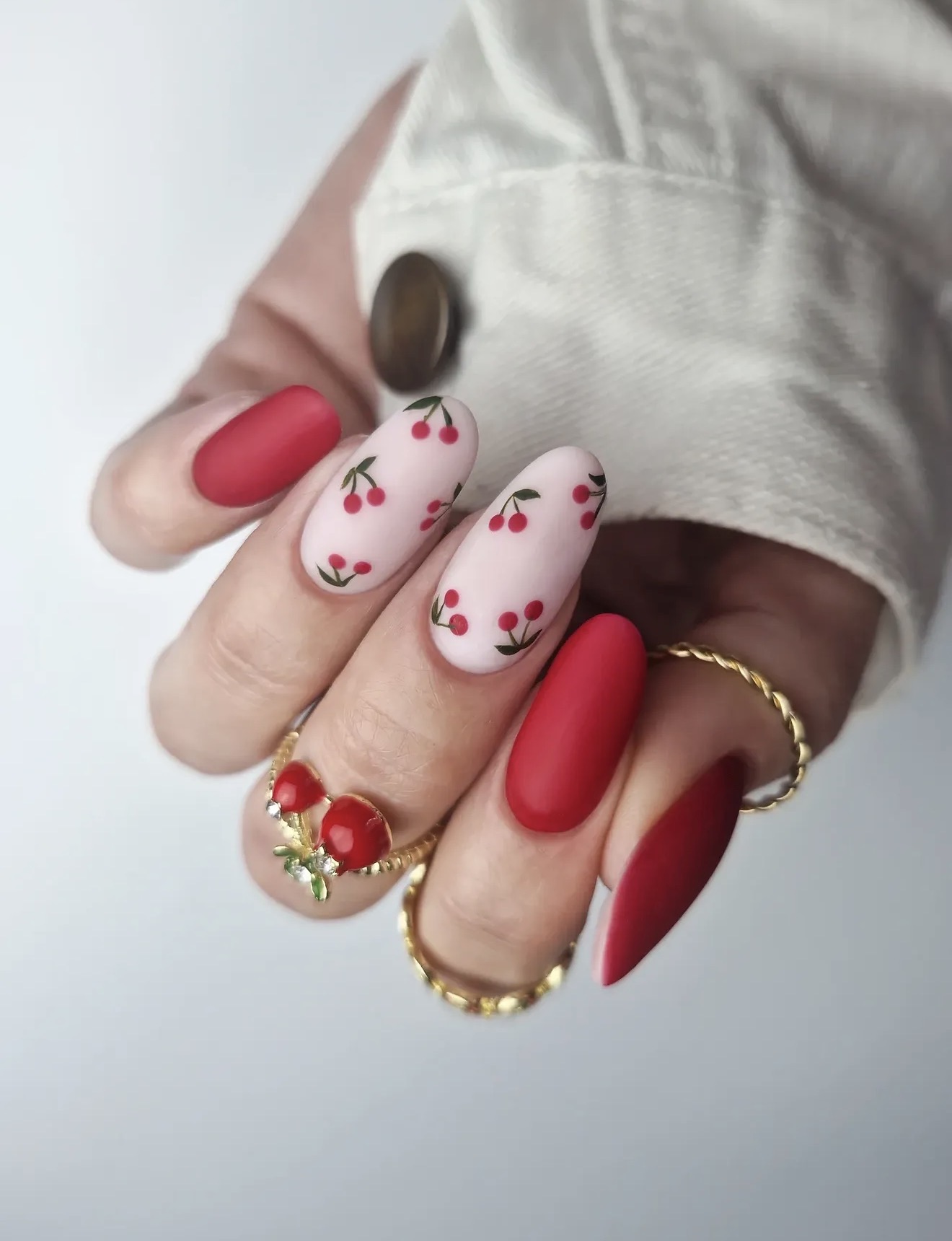 Matte Cherry Red and Cherry Print Almond Nails