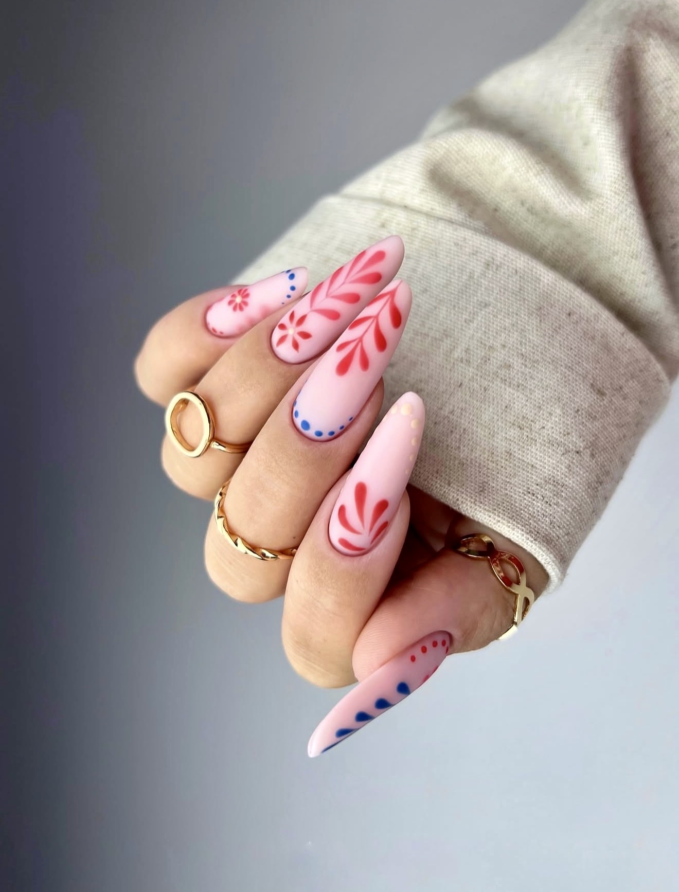 Matte Pink Folk Art Almond Nails