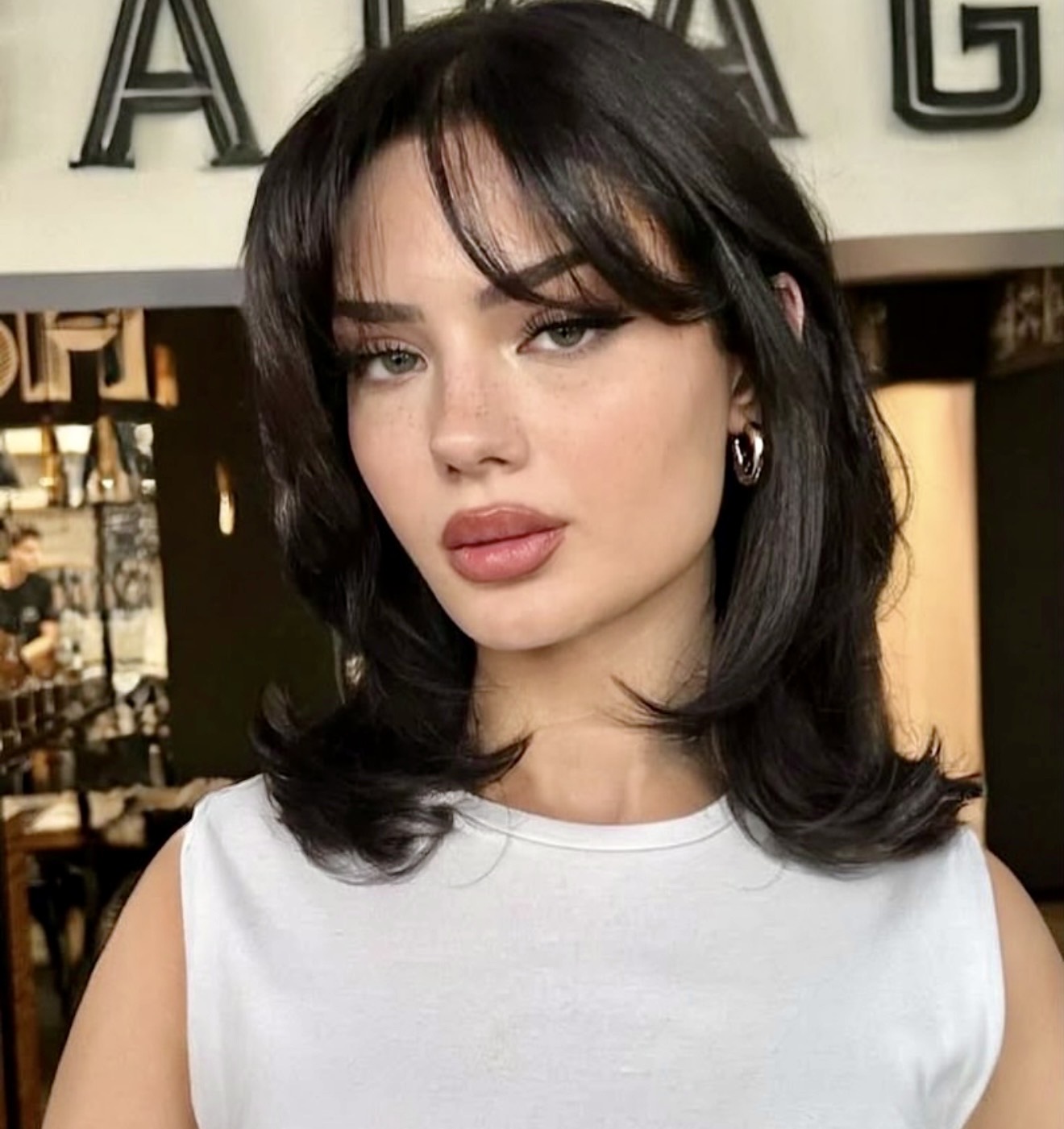 Modern Shaggy Wolf Cut With Wispy Bangs