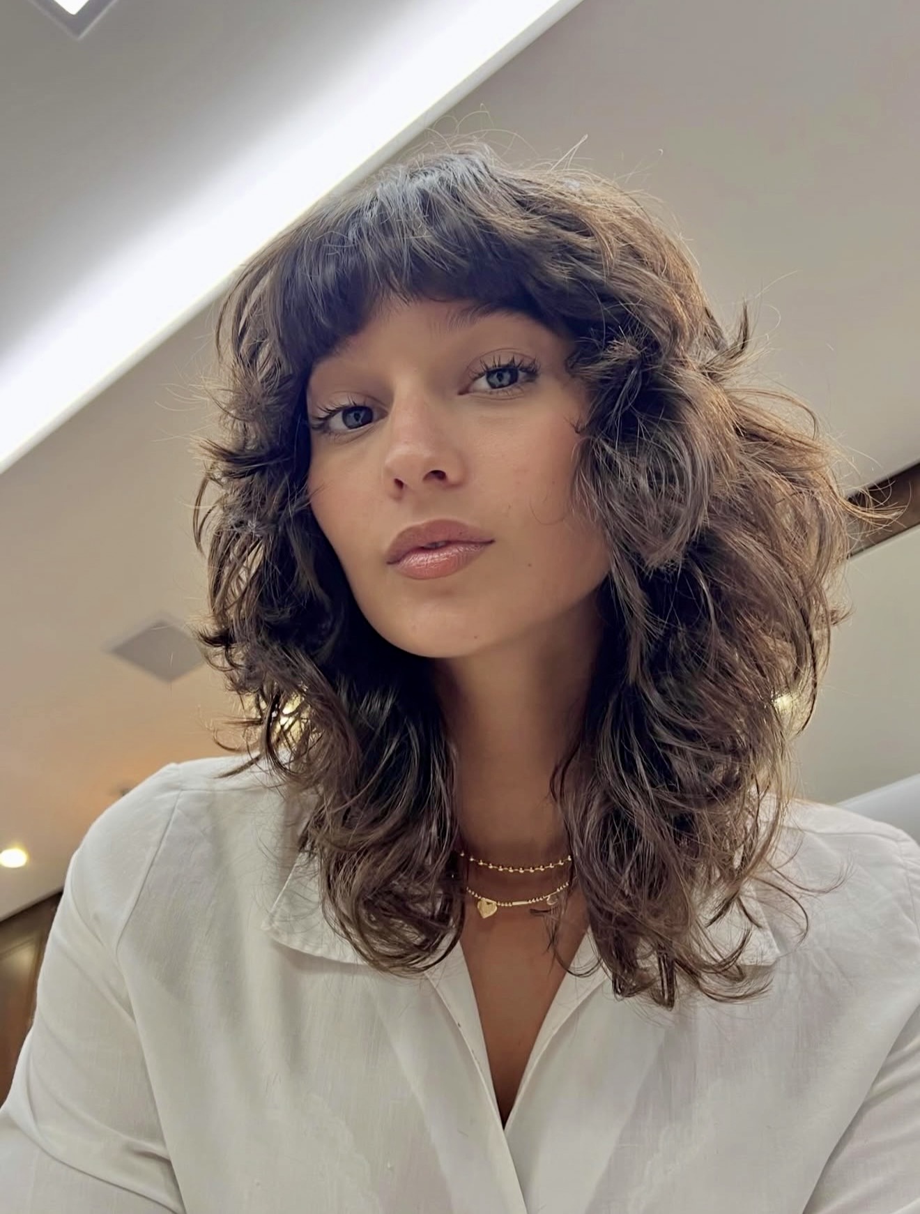 Modern Wolf Cut With Wispy Bangs