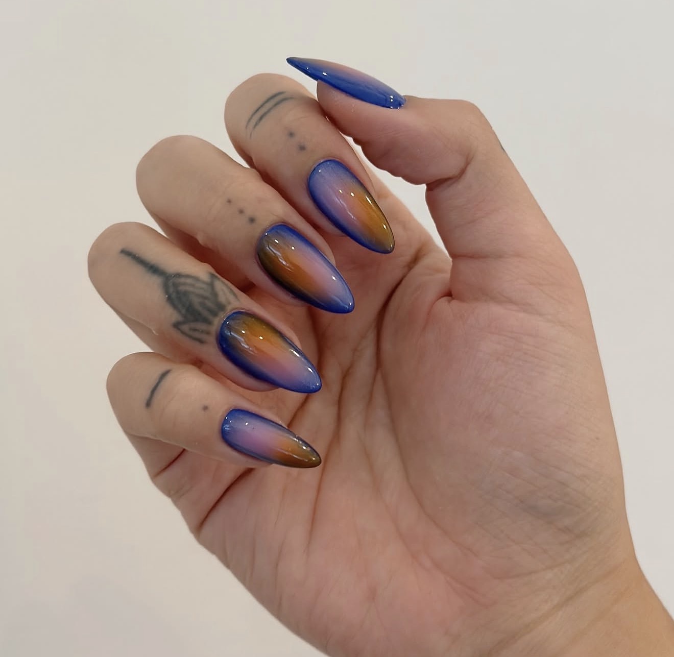 Mystic Aura Gradient Almond Nails