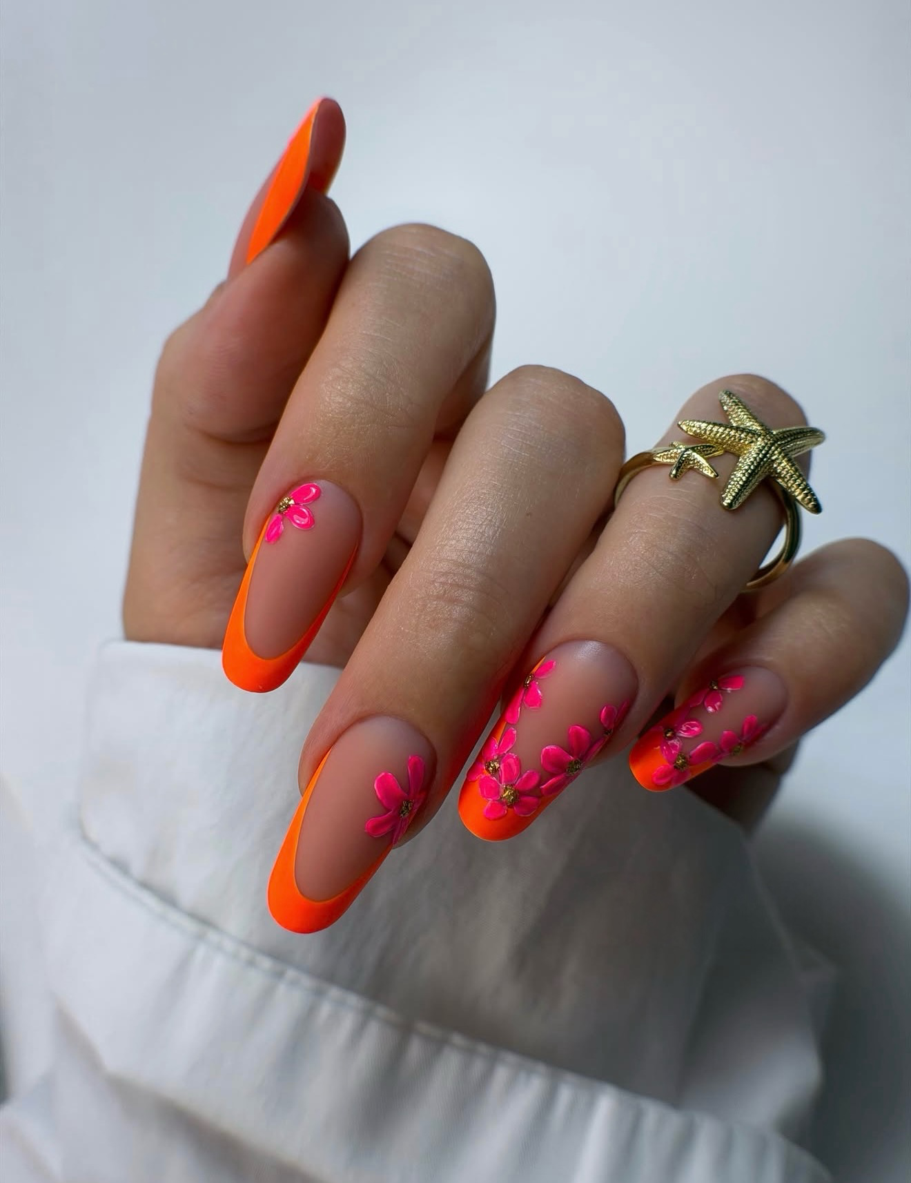 Neon Orange French Tips with 3D Pink Flowers