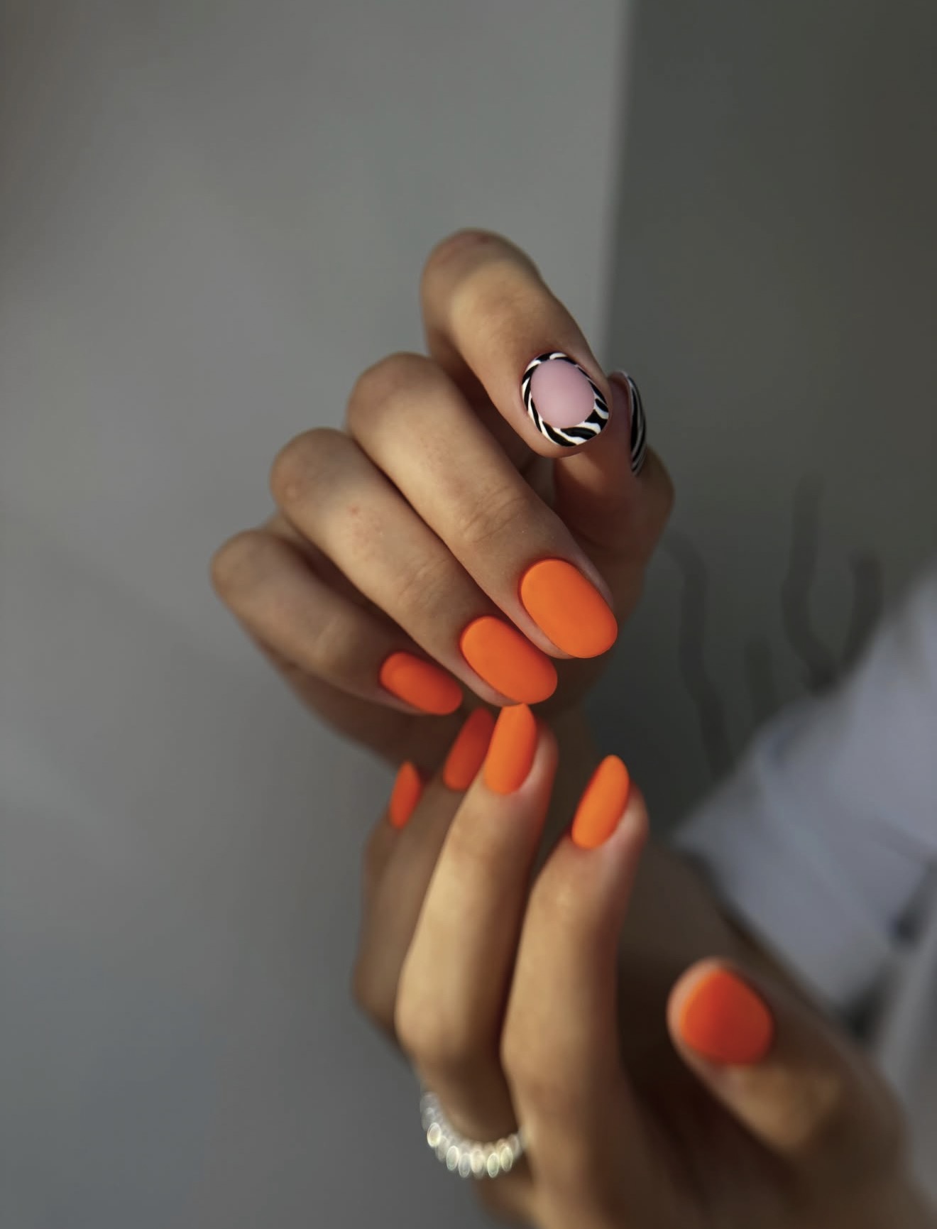 Neon Orange Matte Nails With Zebra French Accent