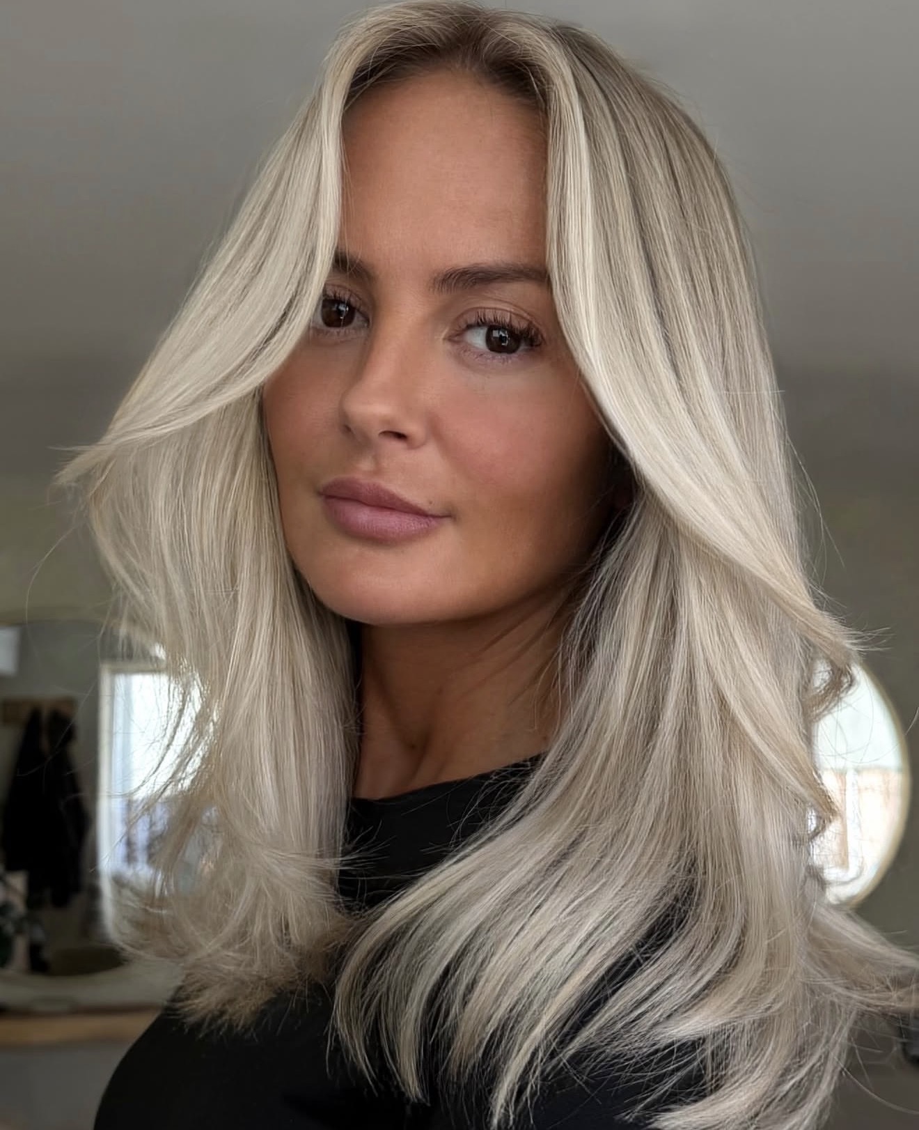 Neutral Blonde Balayage With Face-Framing Layers