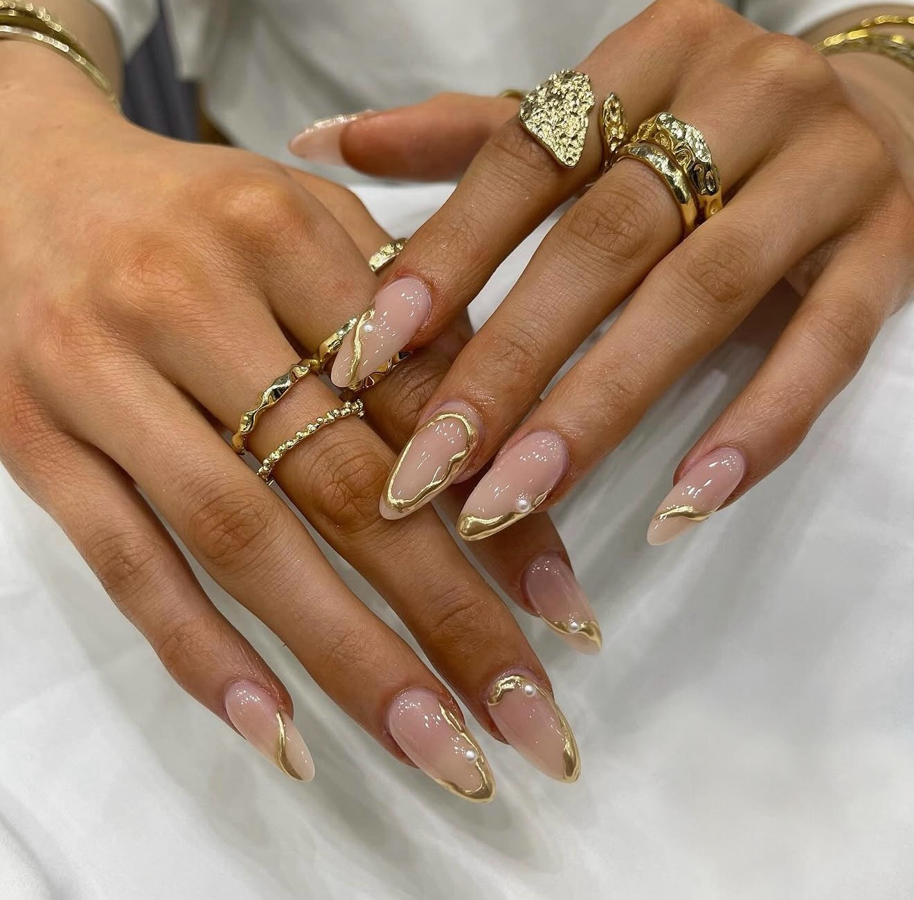Nude French Tips With 3D Gold Swirls and Pearls
