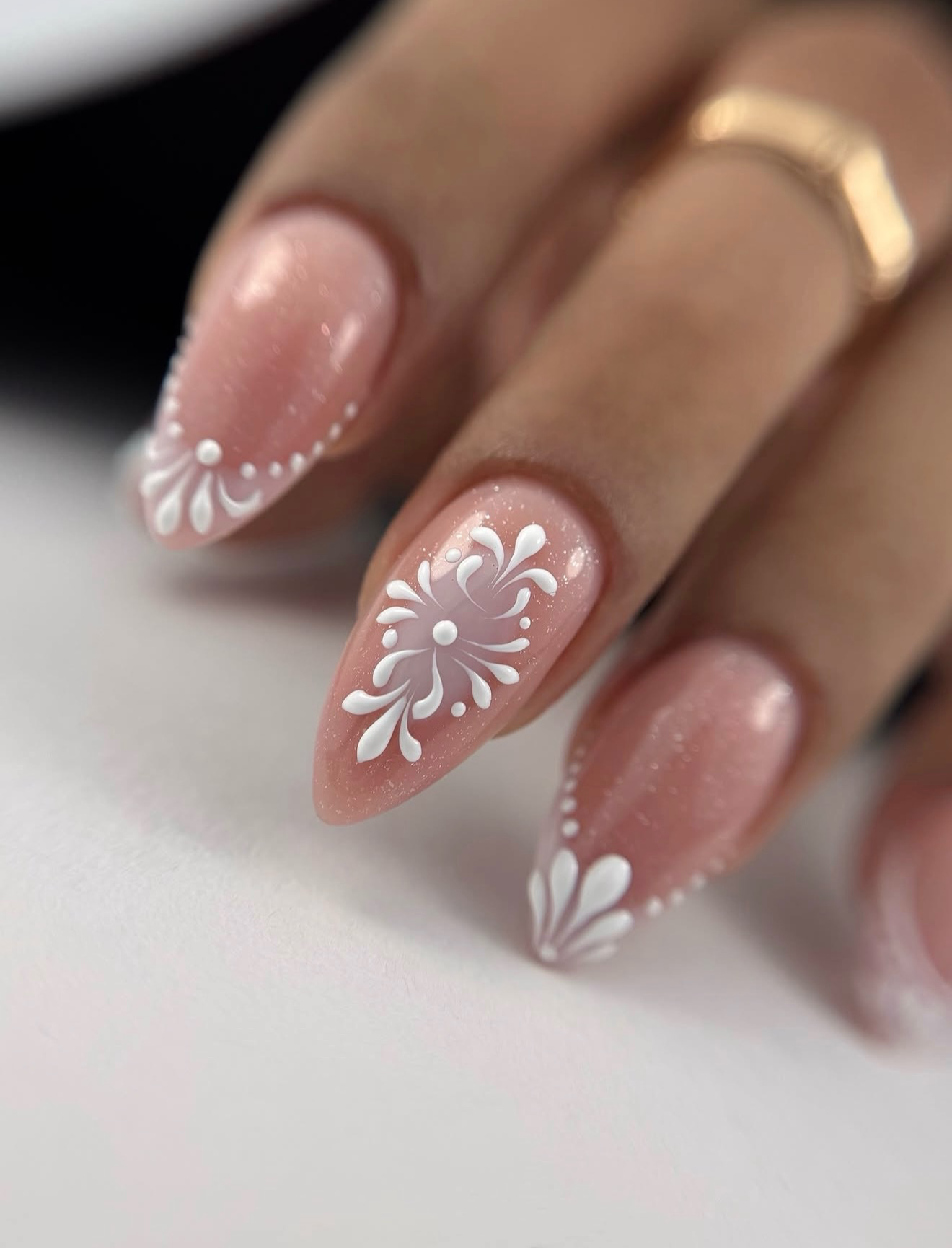 Nude Glitter Almond Nails with White Floral Art