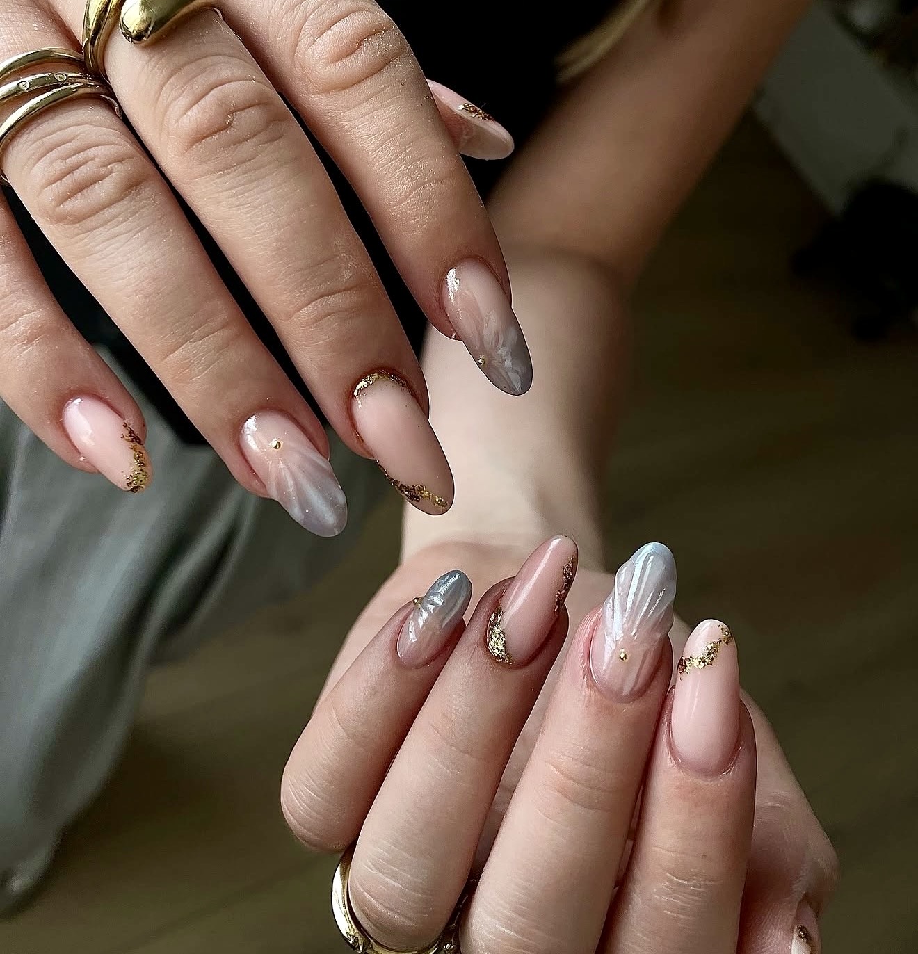 Nude Shell Swirl Almond Nails with Gold Accents