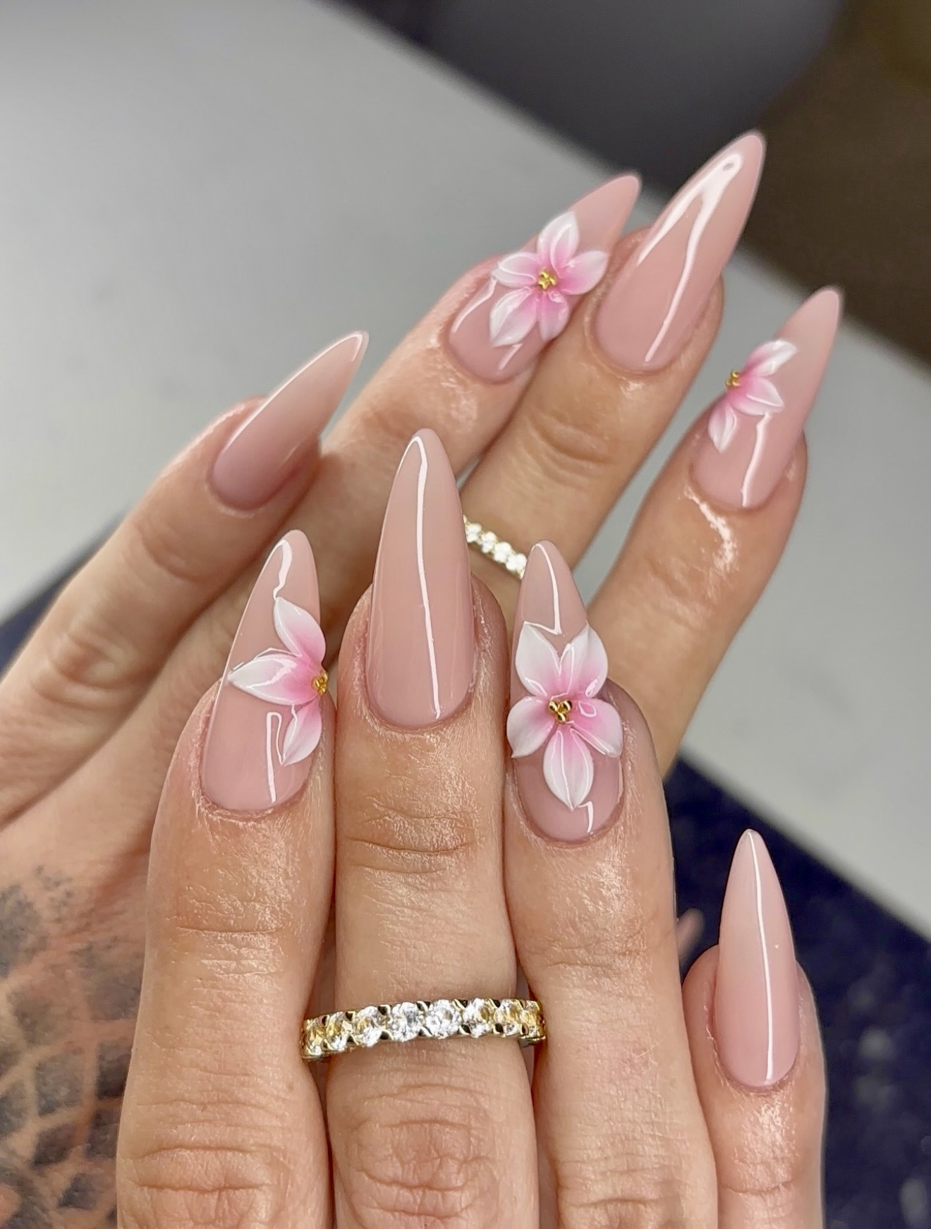 Nude Stiletto Nails with Delicate 3D Pink Flowers