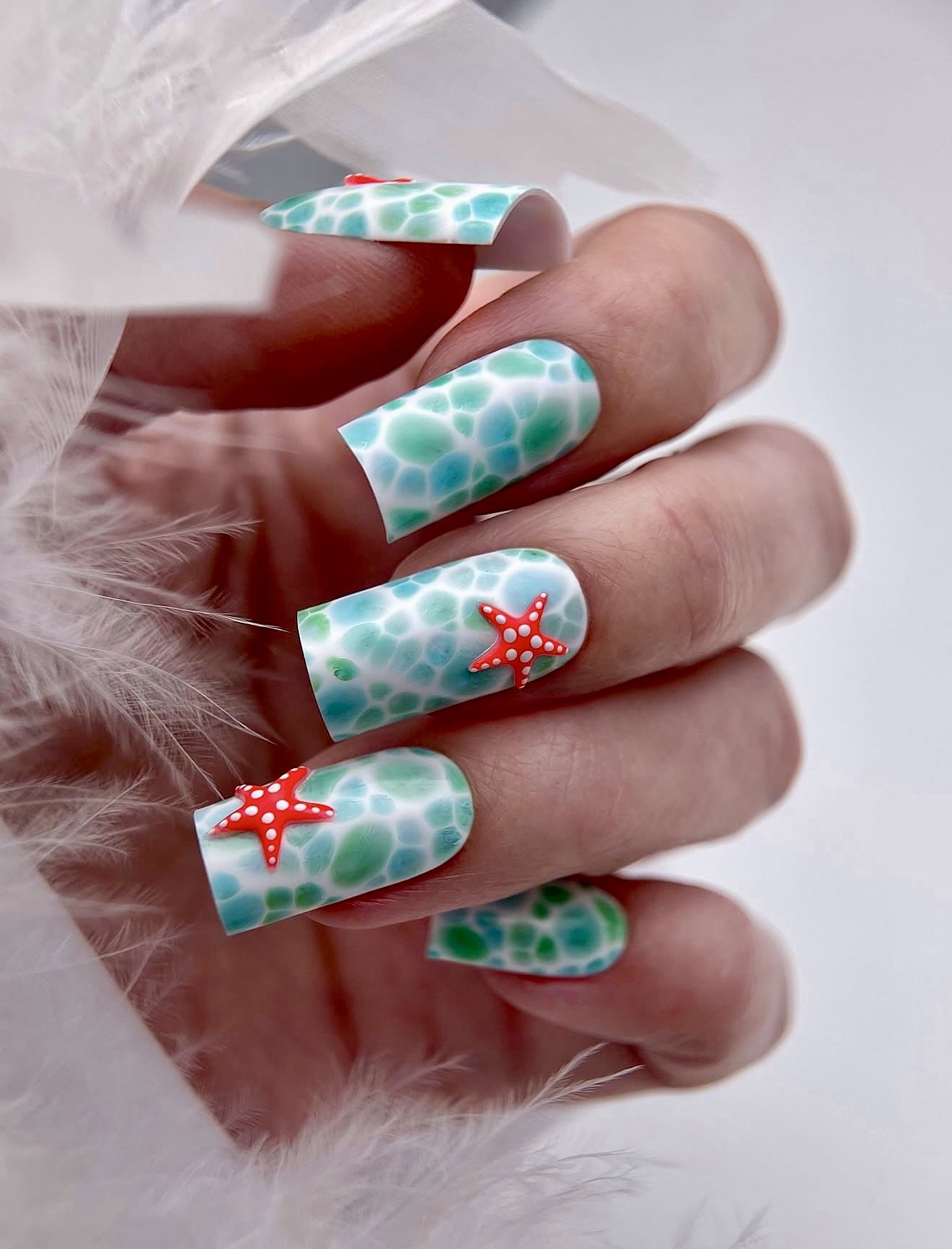 Ocean Water Swirl Starfish French Tip Nails