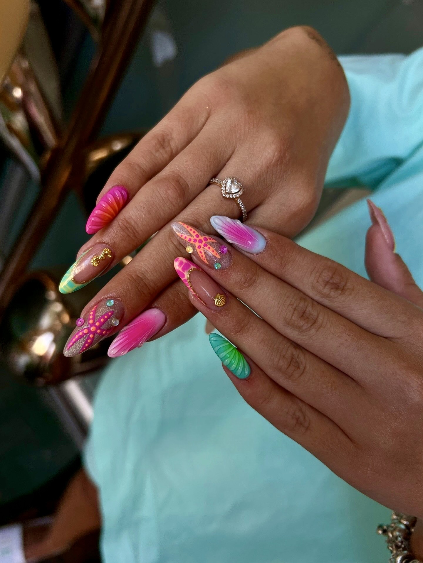 Oceanic Vibes Starfish and Seashell Nail Art