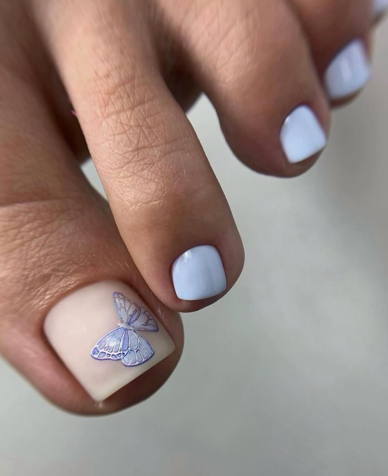 Pastel Blue Butterfly French Pedicure
