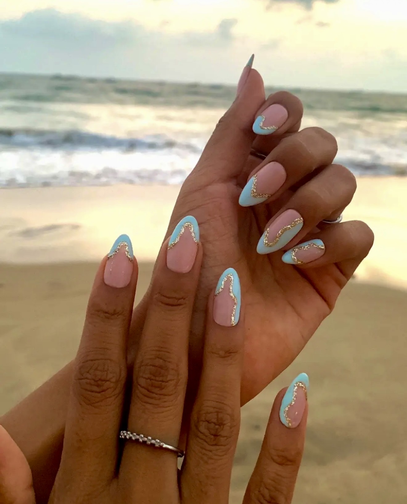 Pastel Blue & Gold Swirl Almond Nails