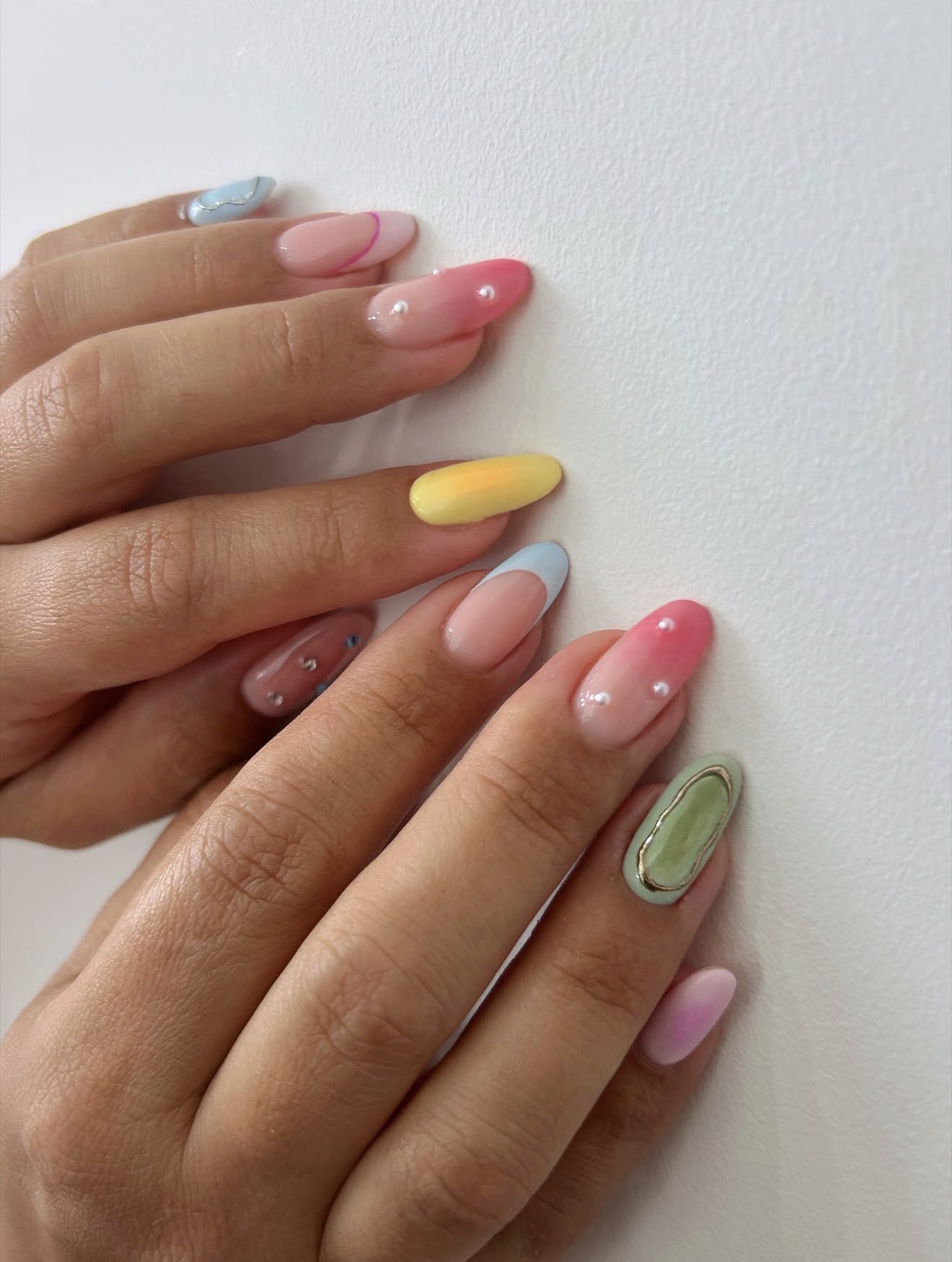 Pastel Ombre French Tips with Pearl Accents