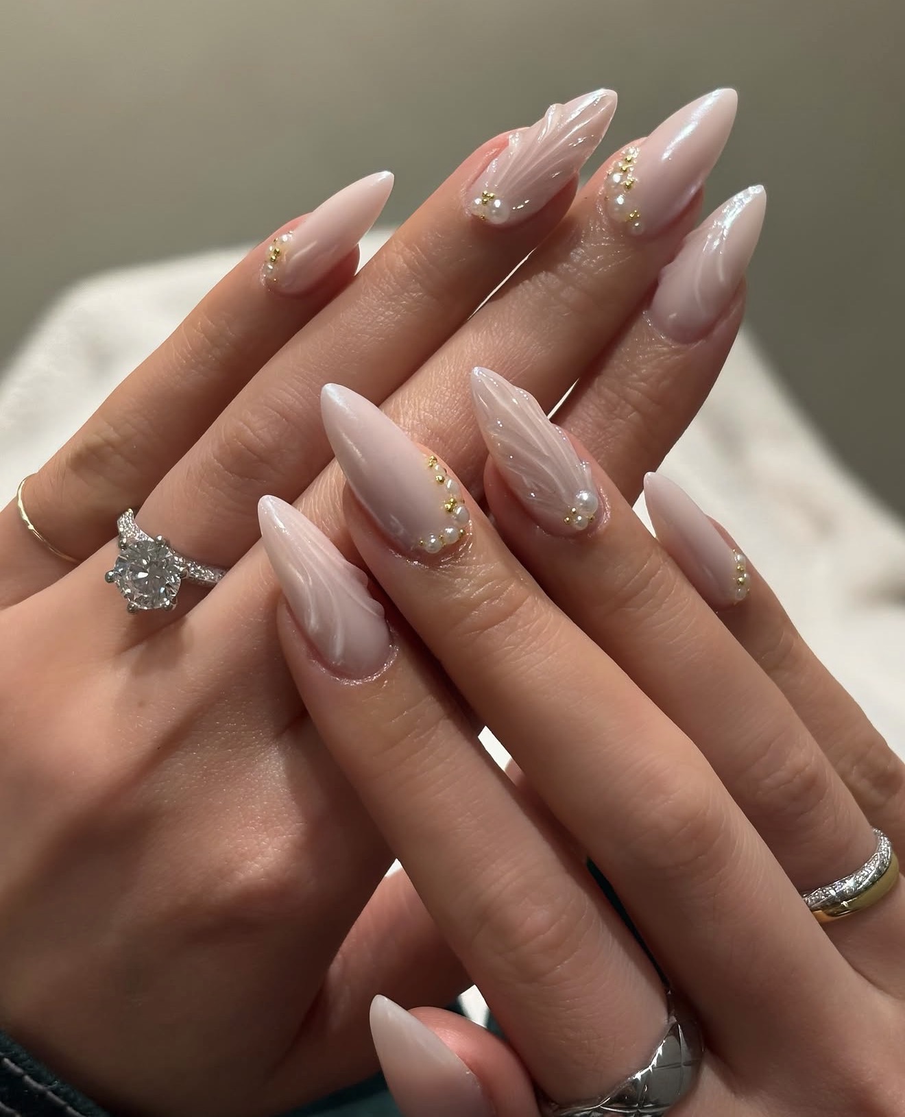 Pearl and Gold Embellished Milky Almond Nails