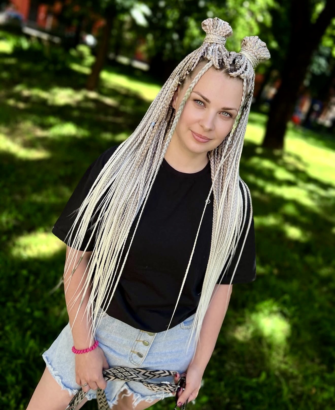 Platinum Blonde Micro Braids With Half-Up Space Buns