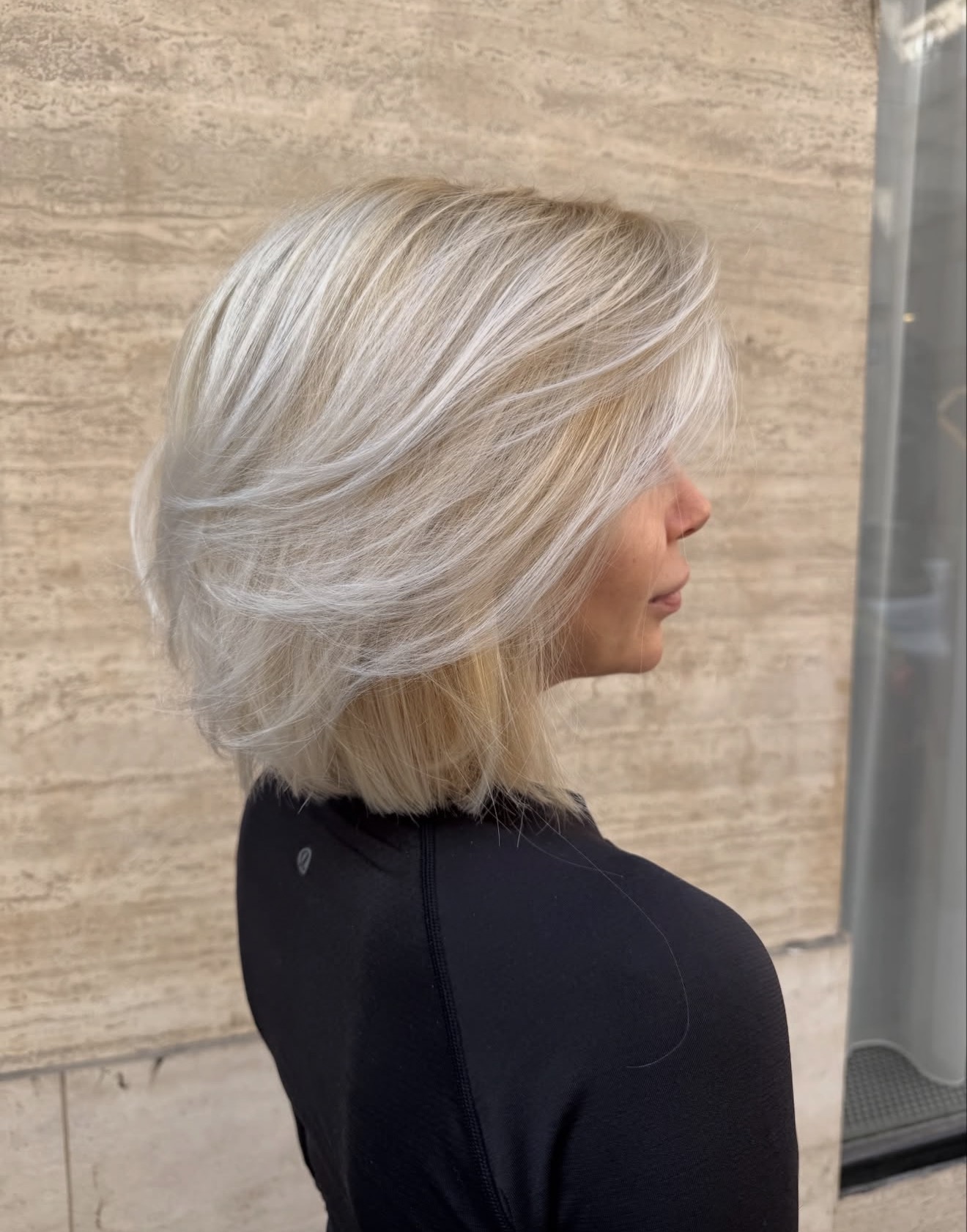 Platinum Blonde Textured Bob With Face Framing Layers