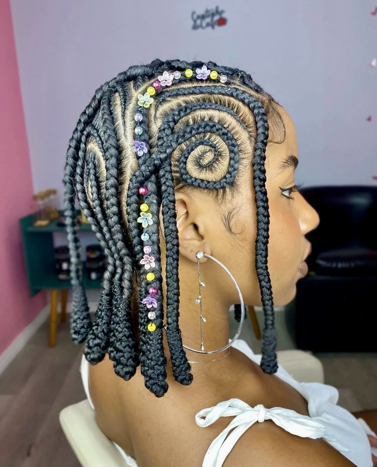 Playful Beaded Cornrow Braids With Spiral Accent