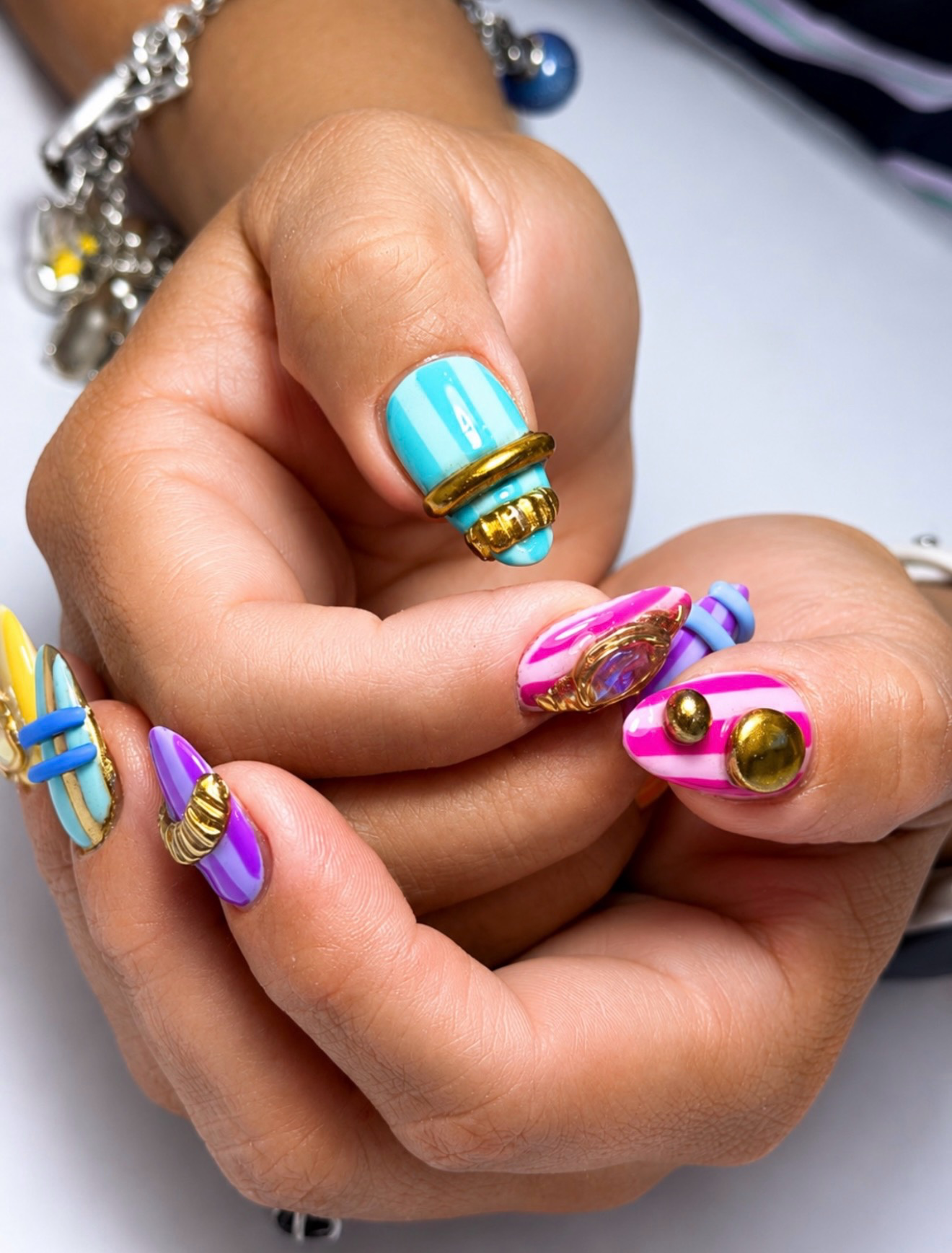 Playful Candy Stripes with 3D Gold Charms