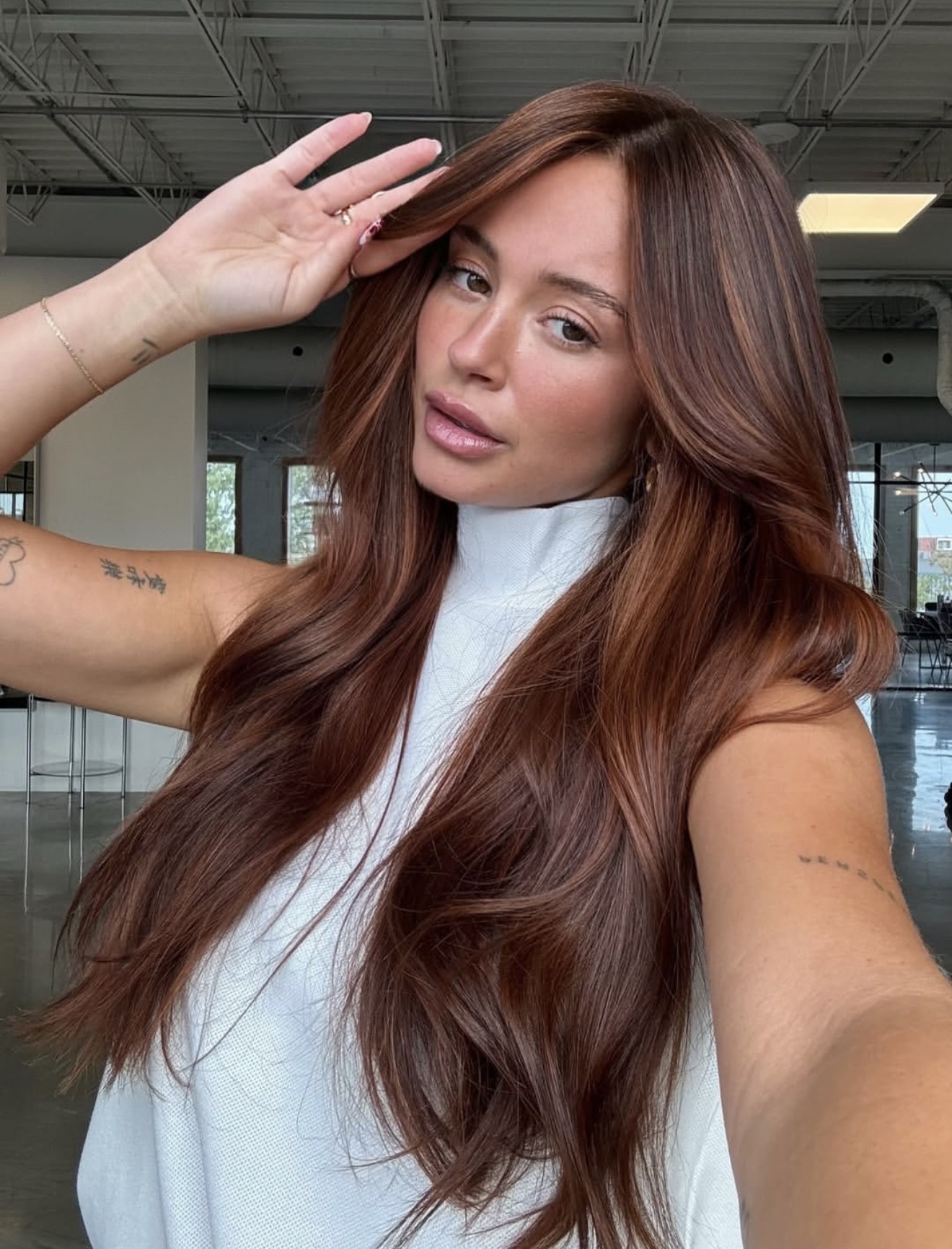 Rich Auburn Balayage With Face-Framing Layers