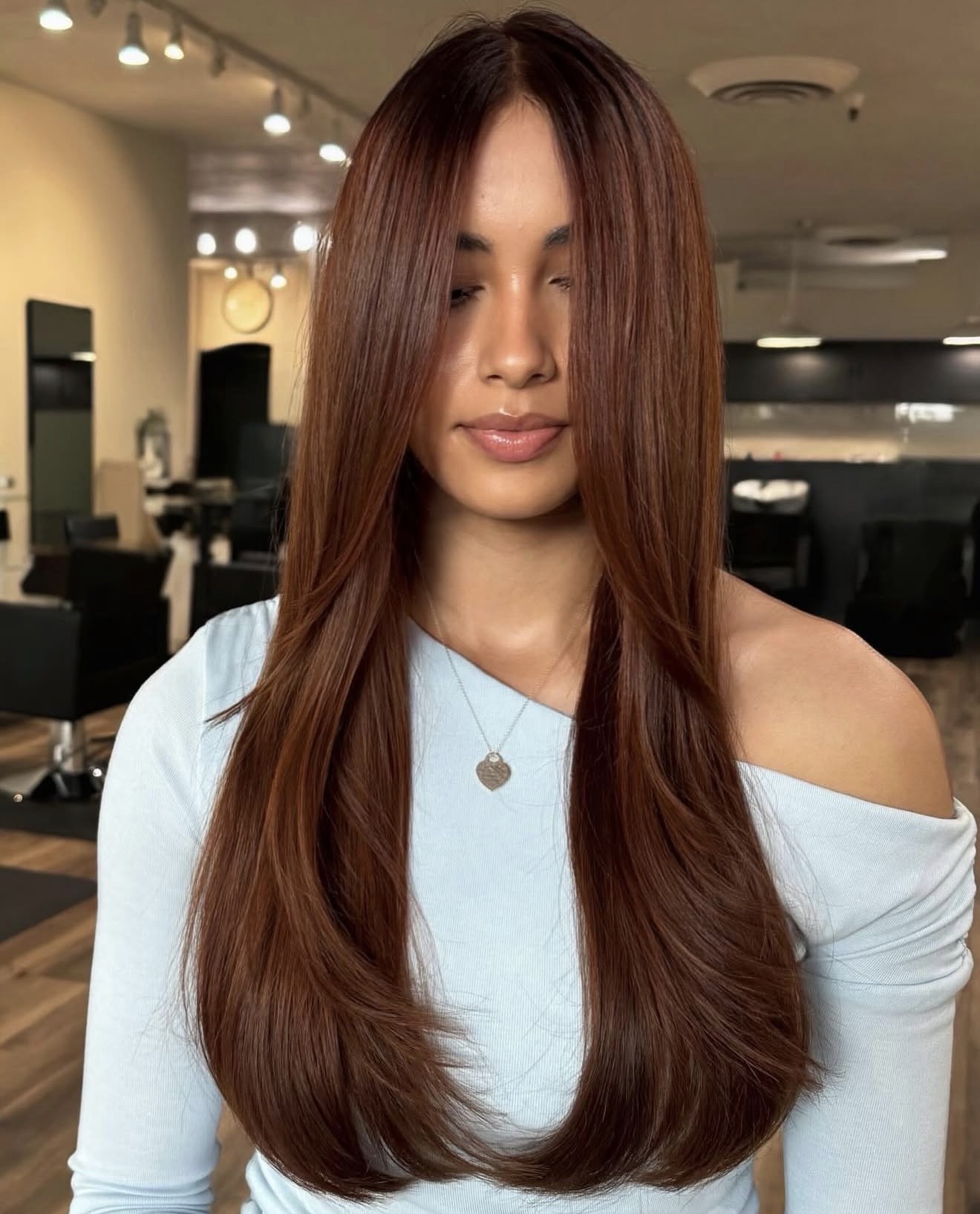 Rich Auburn Balayage With Face-Framing Layers