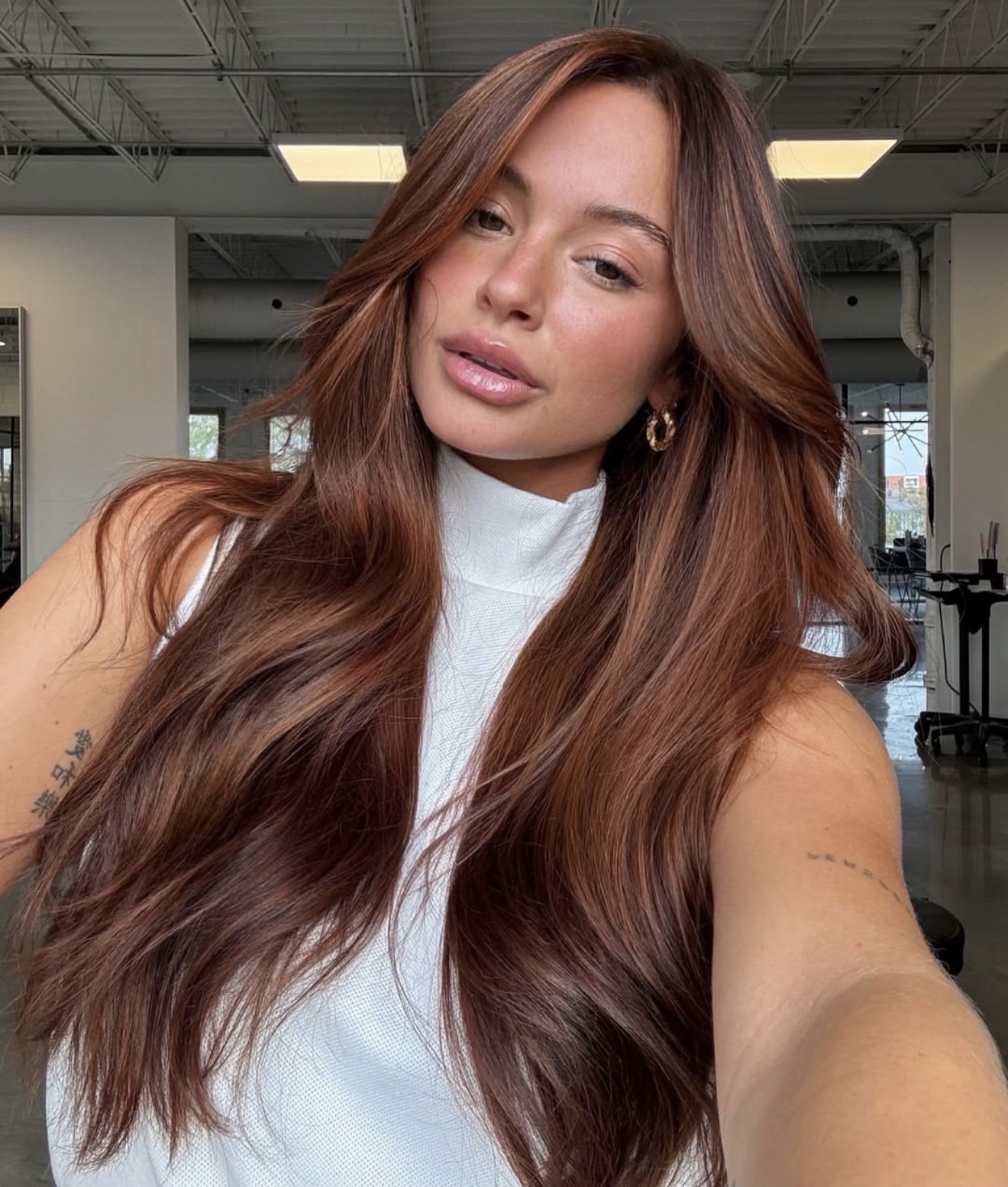 Rich Auburn Balayage With Soft Waves