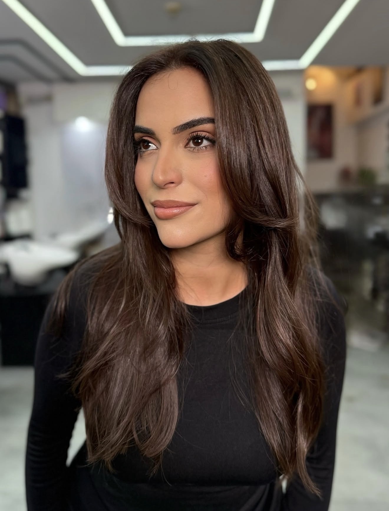 Rich Chocolate Brunette With Face-Framing Layers