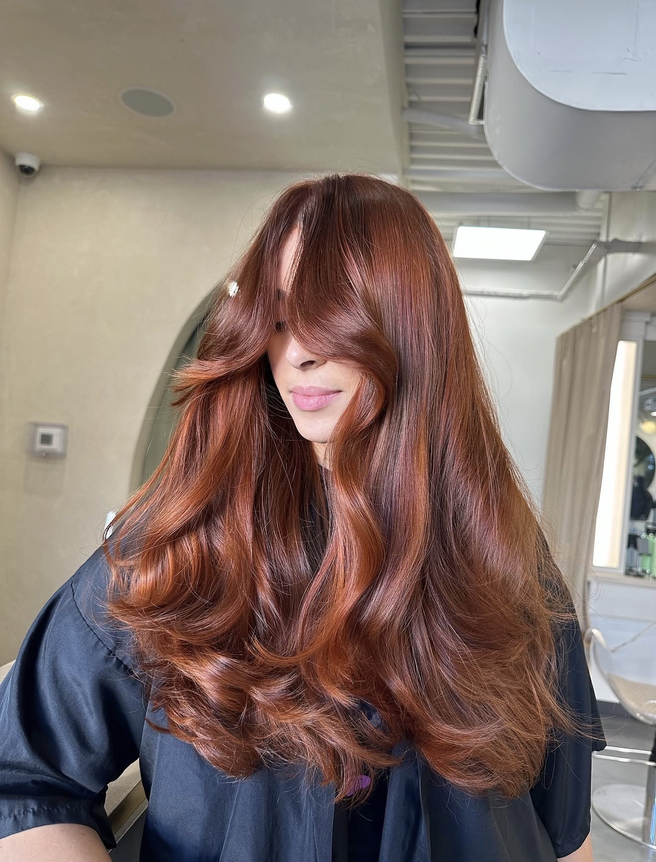 Rich Copper Balayage With Soft Face-Framing Layers