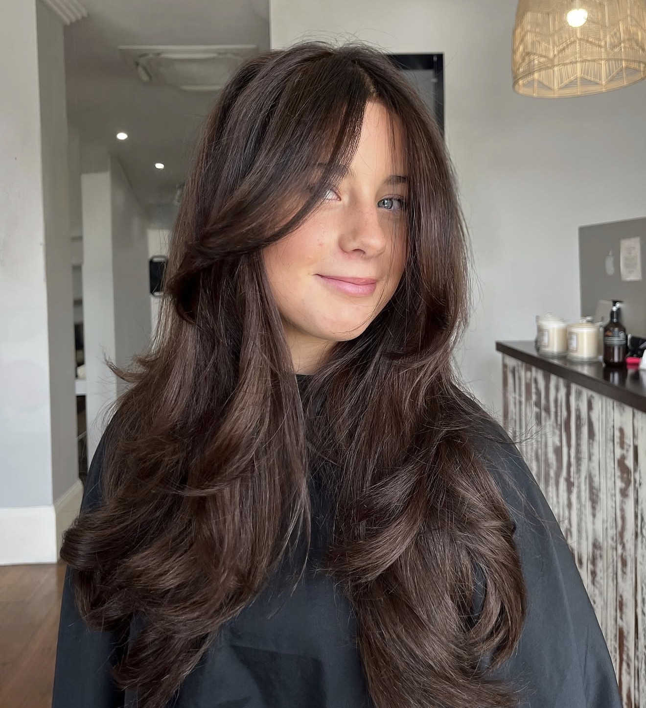 Rich Espresso Layers With Face-Framing Bangs