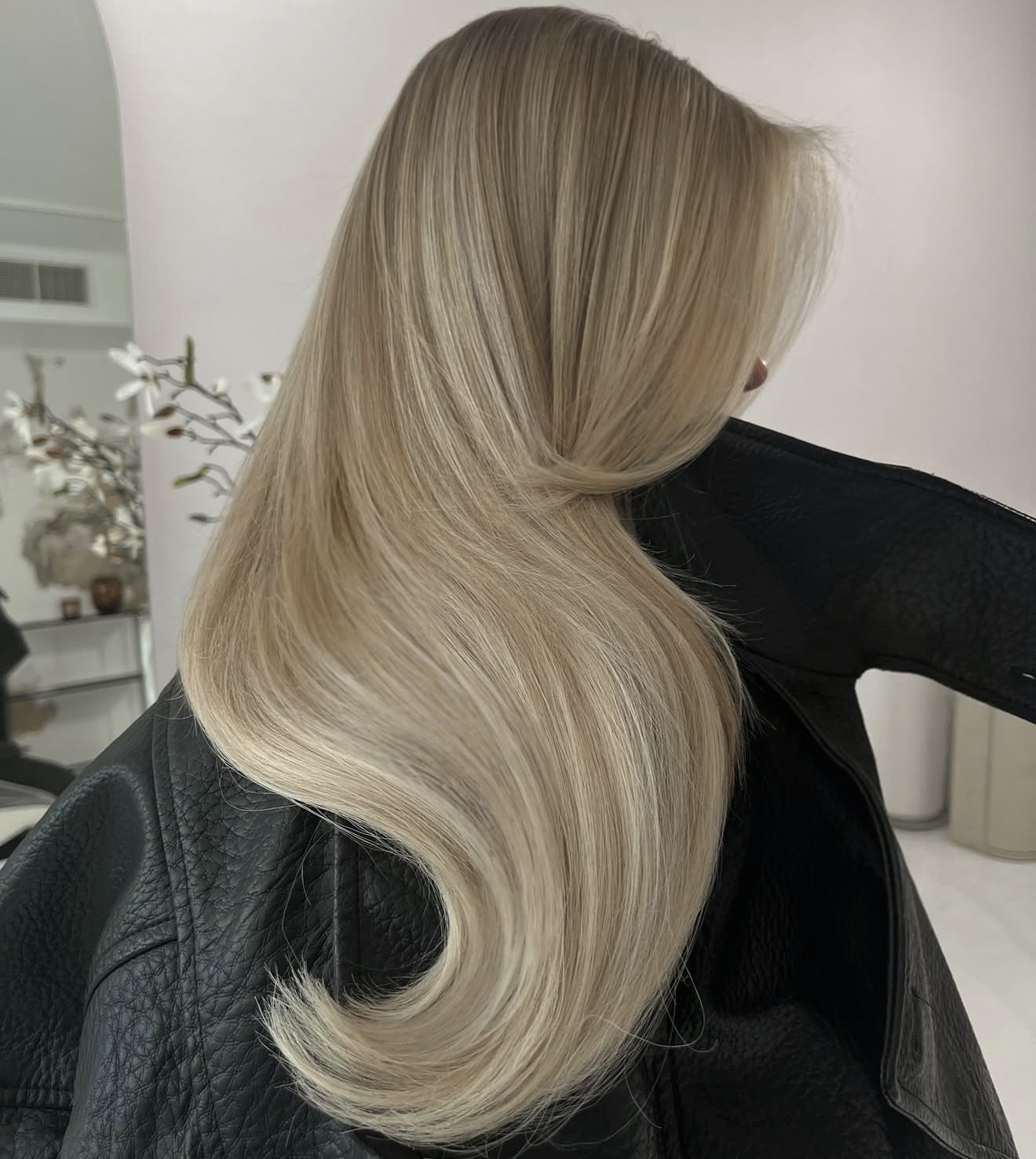 Sandy Blonde Waves With Face-Framing Layers