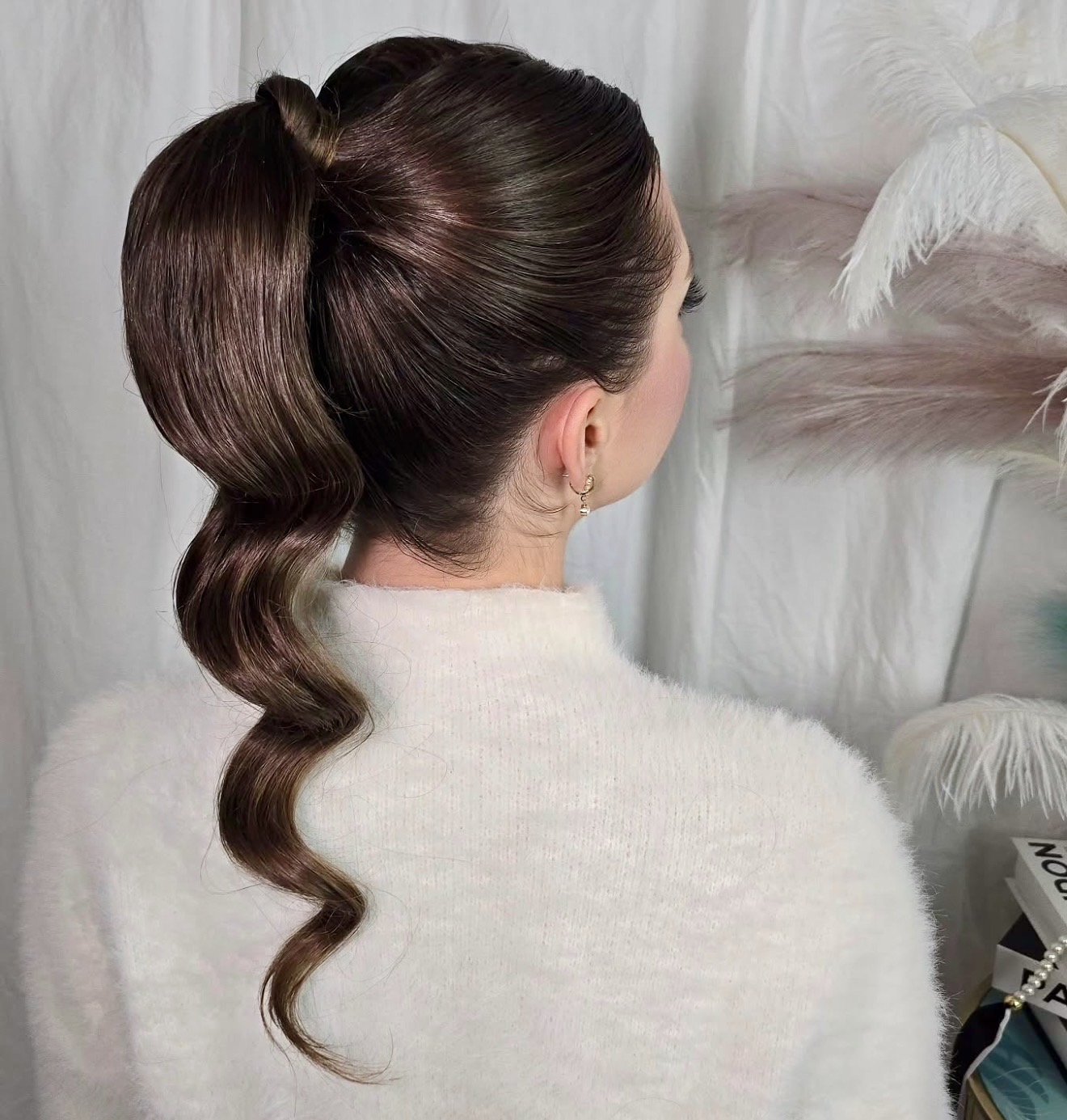 Sculpted High Ponytail With Hollywood Waves
