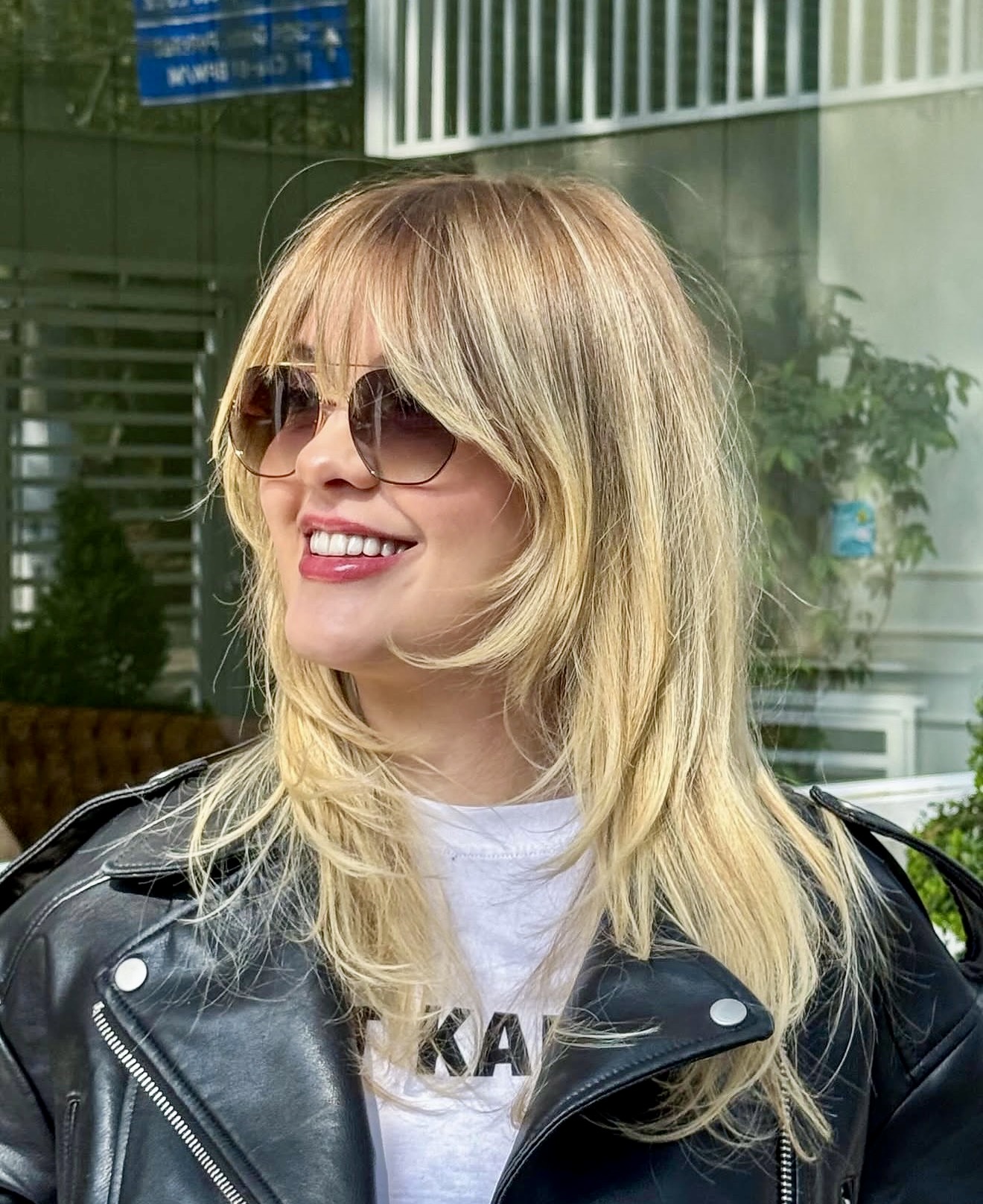 Shaggy Layers With Honey Blonde Curtain Bangs