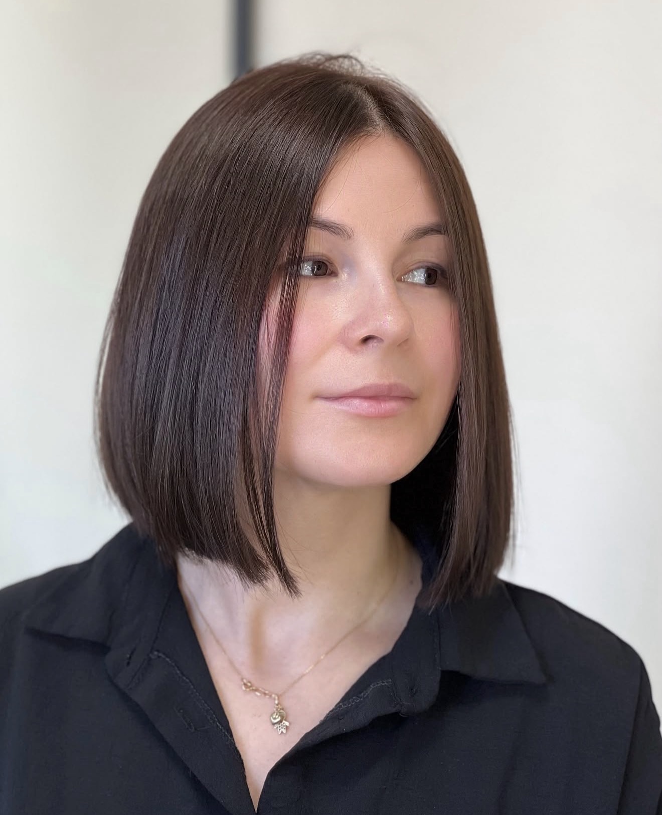 Sharp Blunt Bob With Subtle Face-Framing Layers