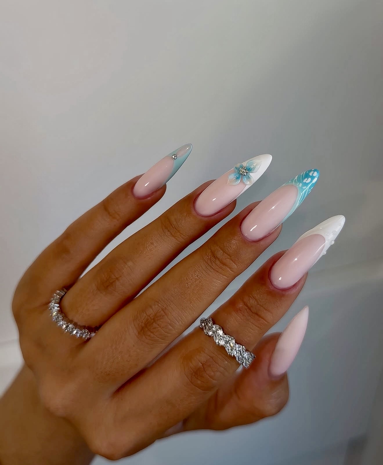Sky Blue Floral French Almond Nails