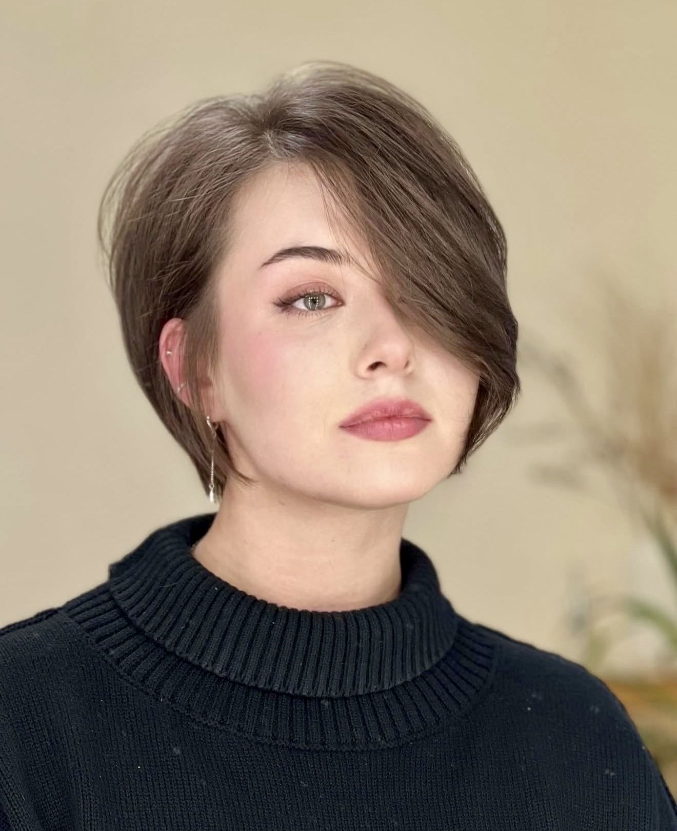 Sleek Asymmetrical Pixie With Deep Side Part