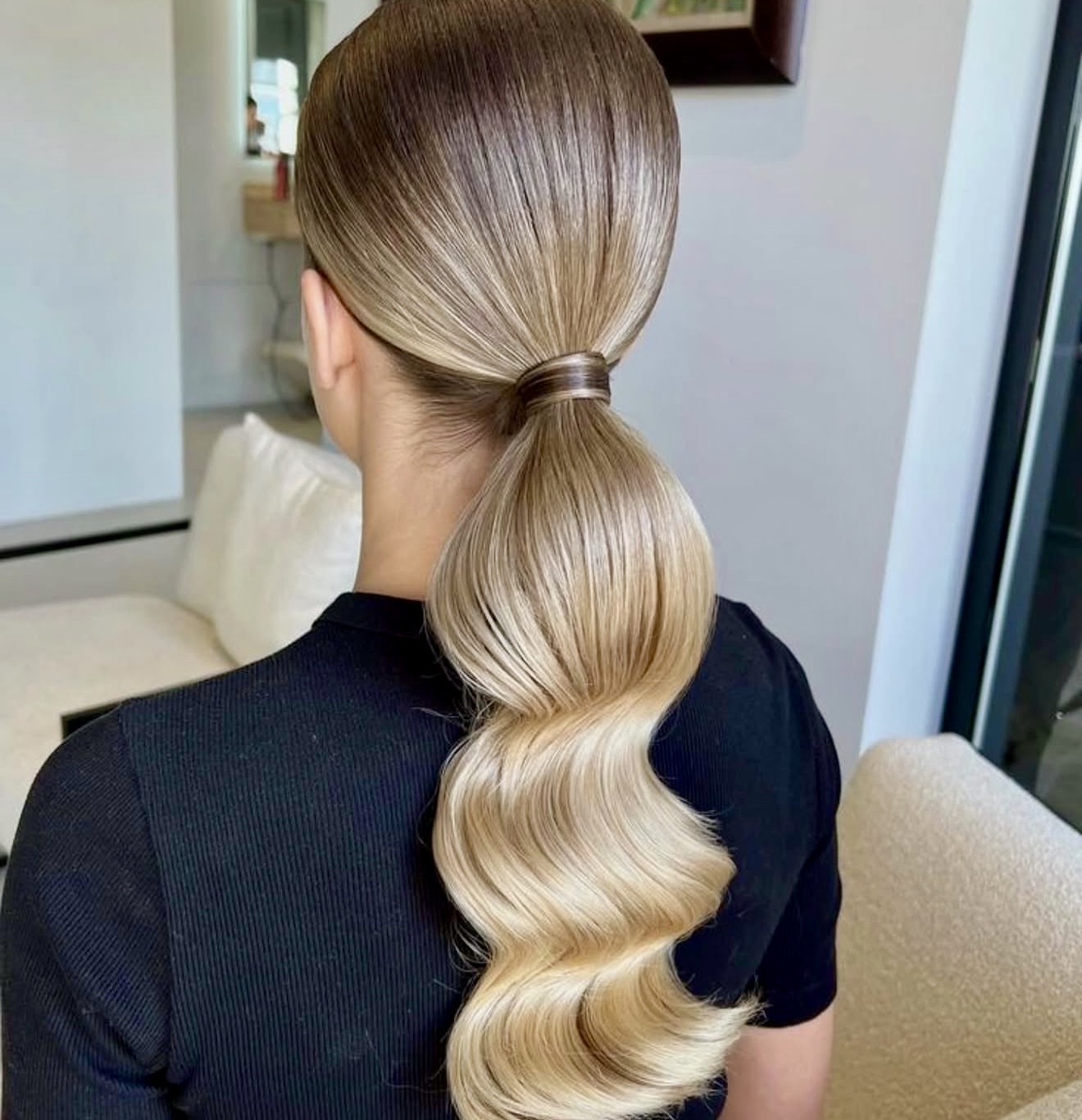 Sleek High Ponytail With Hollywood Waves
