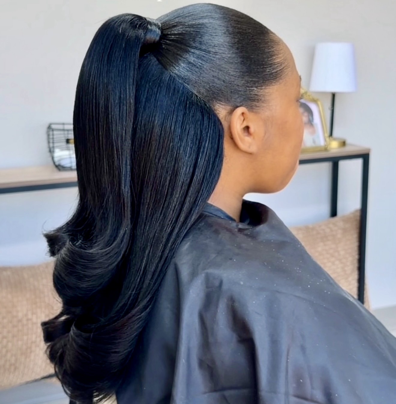 Sleek High Ponytail With Hollywood Waves