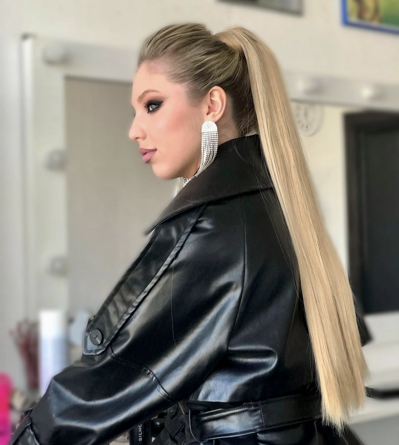 Sleek High Ponytail With Platinum Blonde Radiance