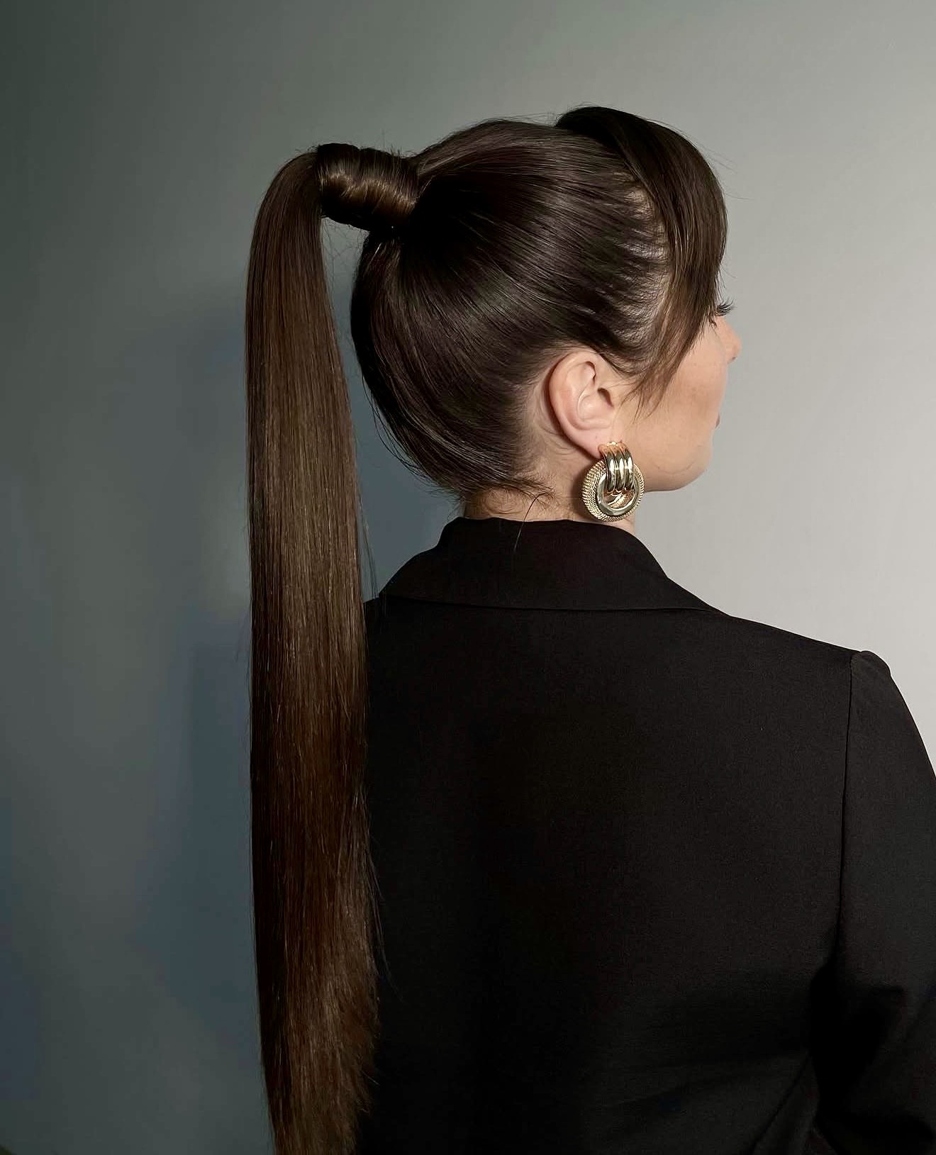 Sleek High Ponytail With Wrapped Accent