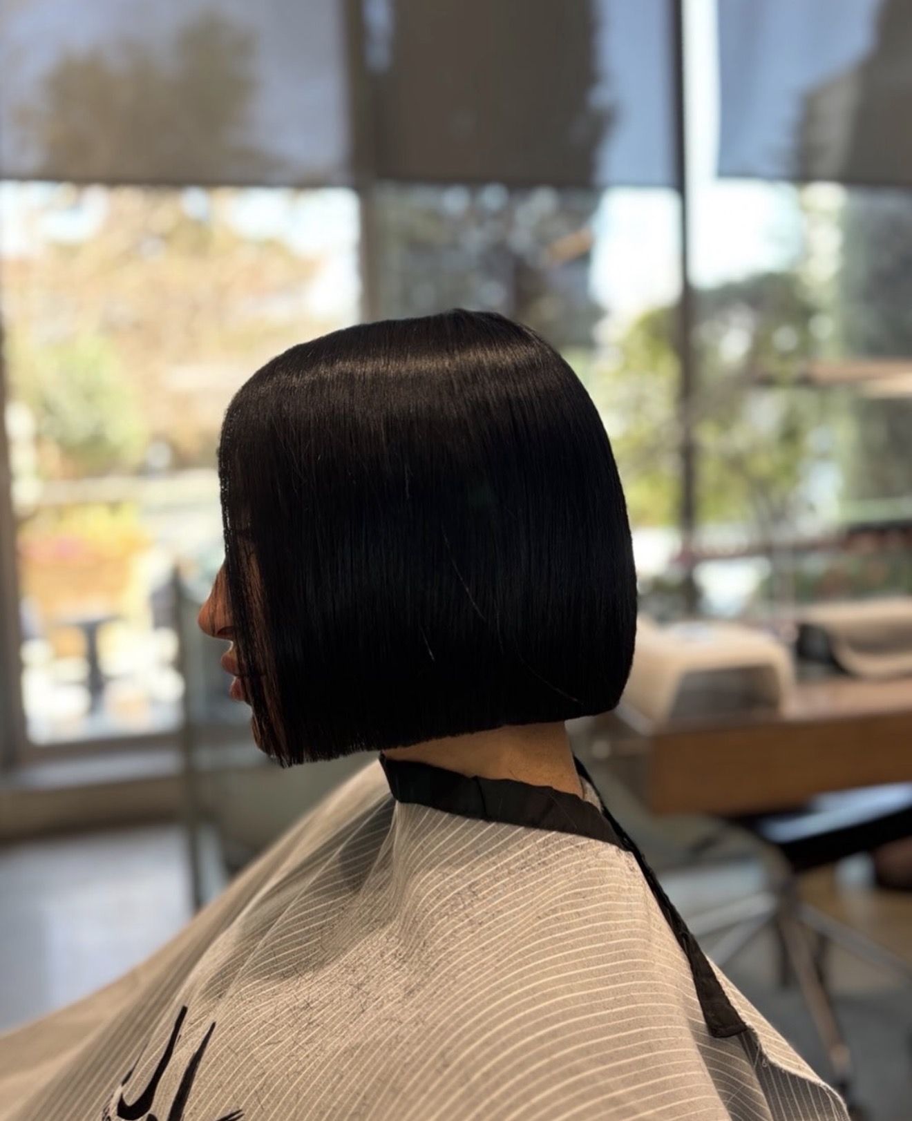 Sleek Jet Black Blunt Bob With Face Framing