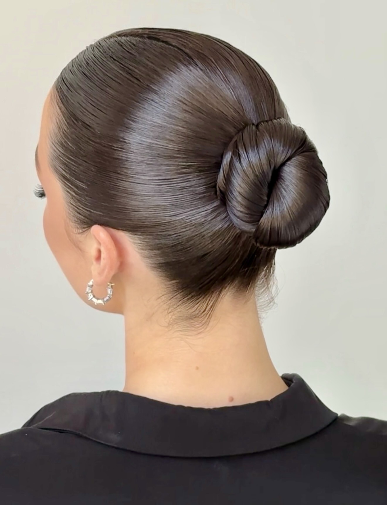 Sleek Polished Low Bun Hairstyle