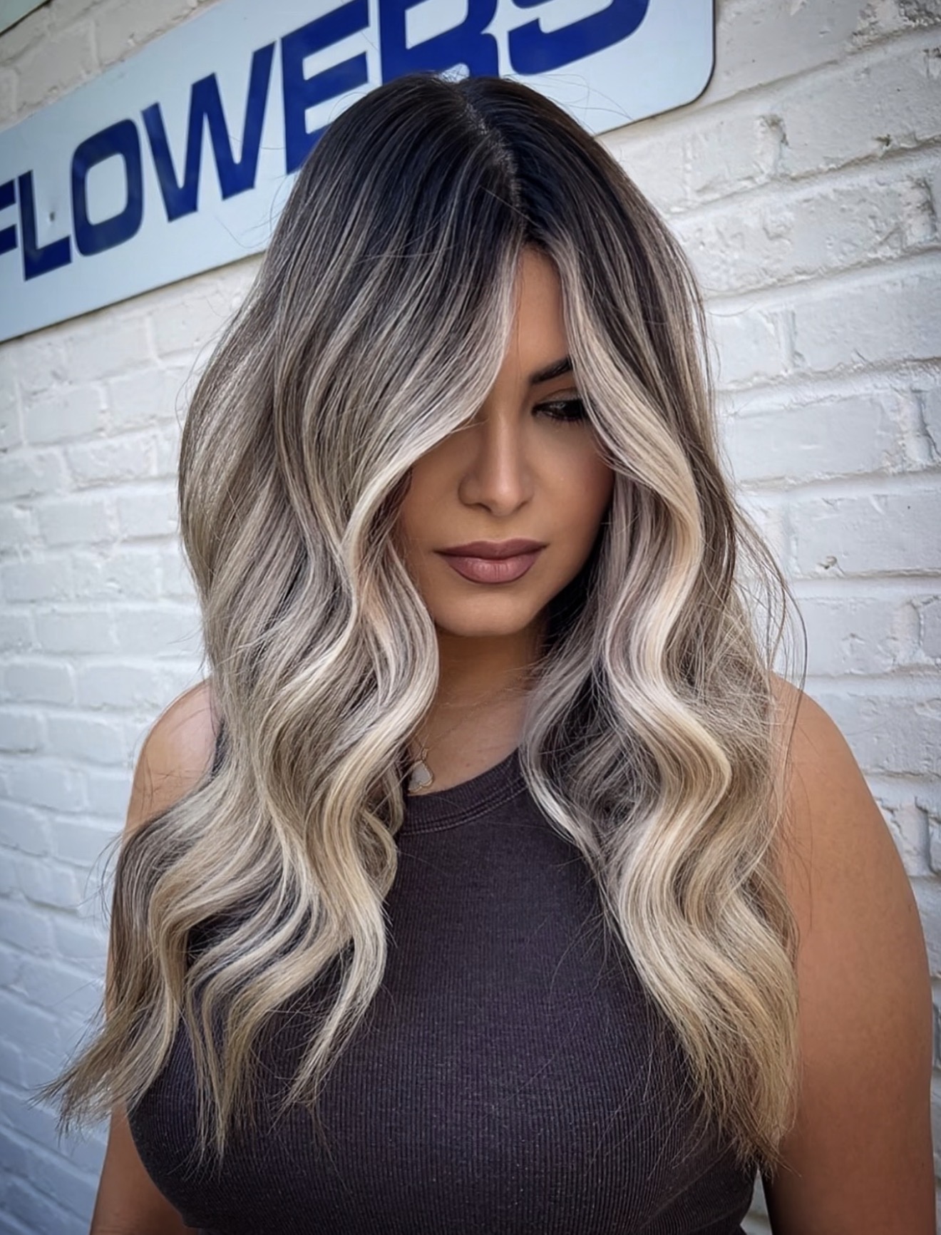Smoky Ash Blonde Balayage With Loose Waves