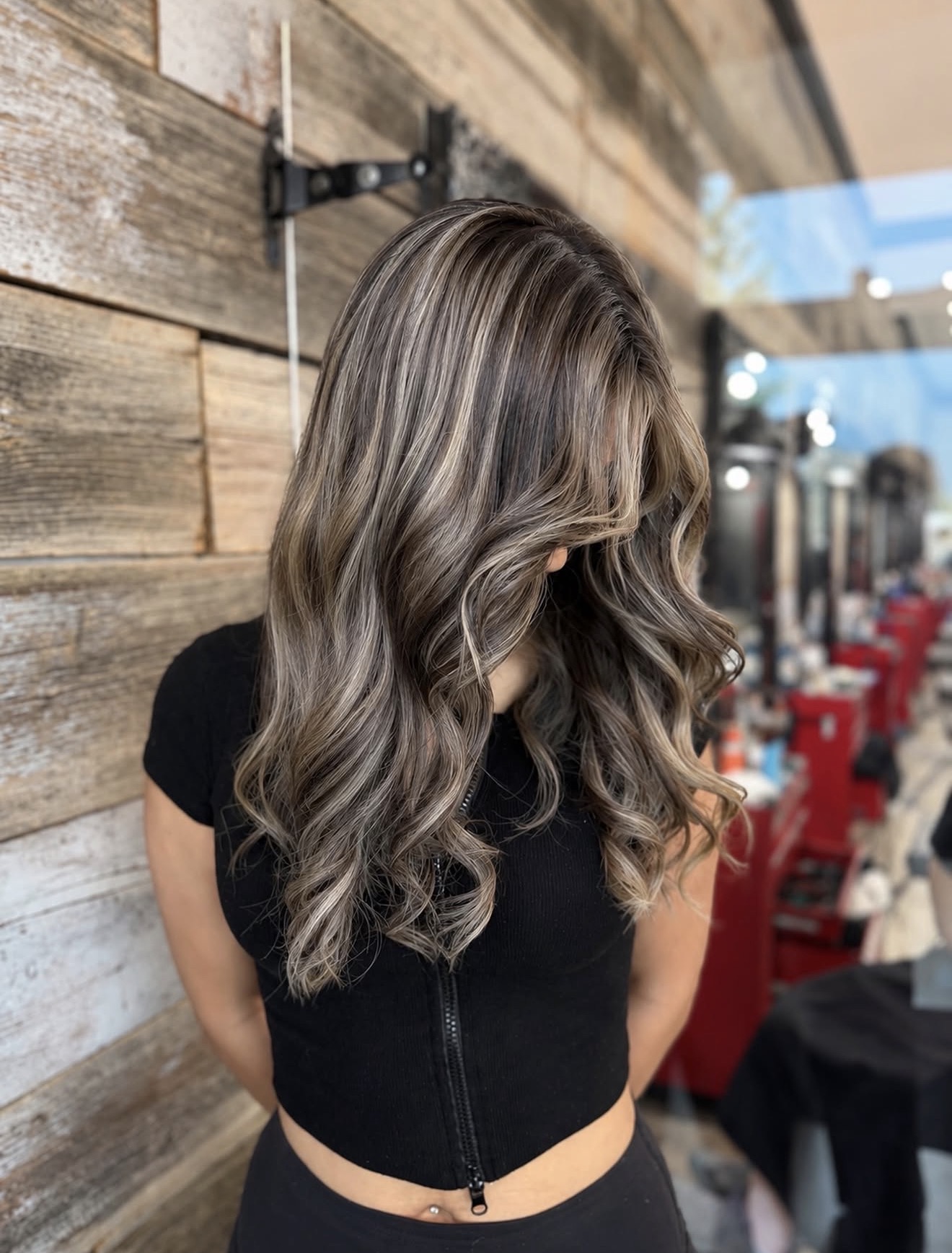 Smoky Ash Blonde Highlights On Dark Brown Waves