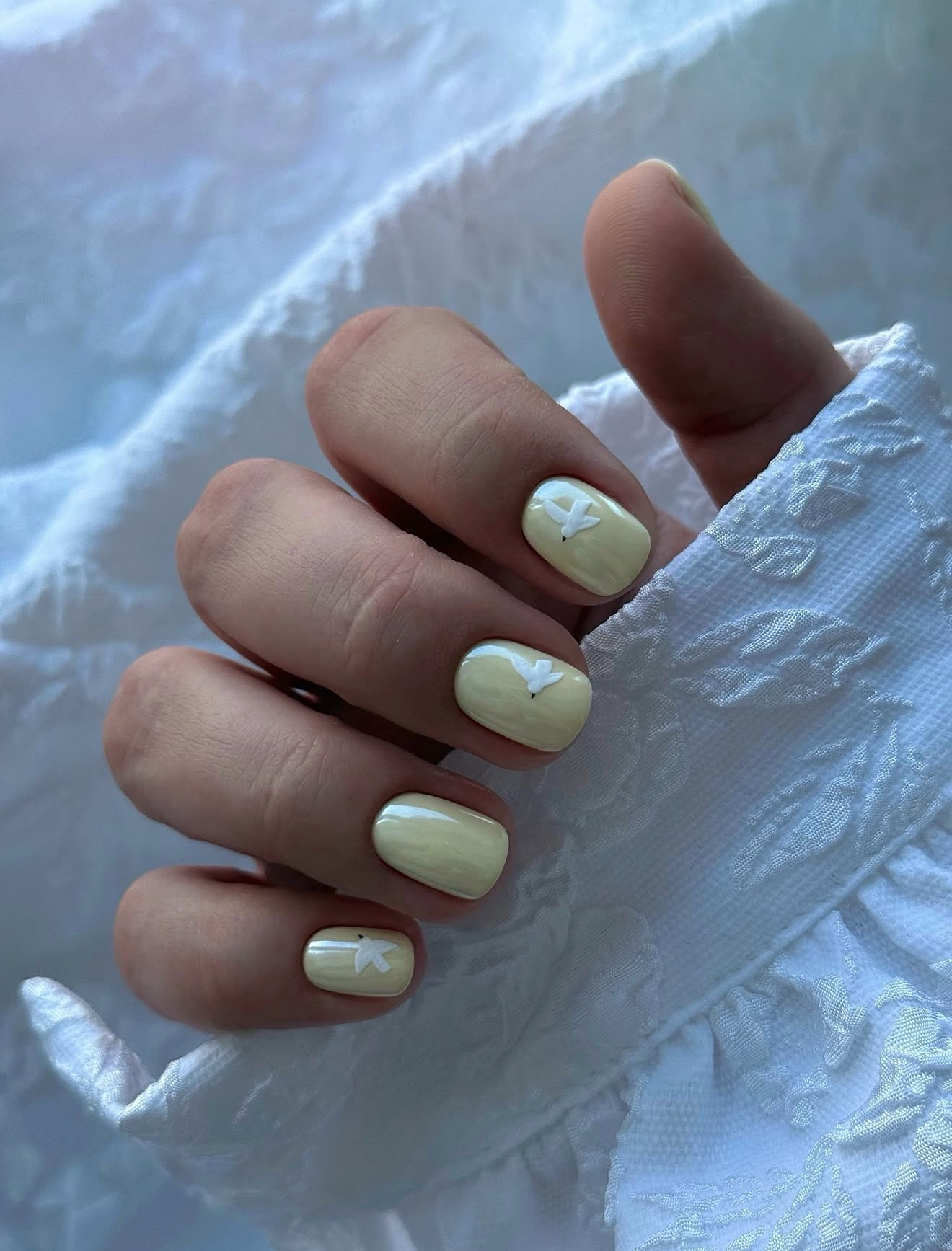 Soft Butter Yellow Nails with White Bird Art