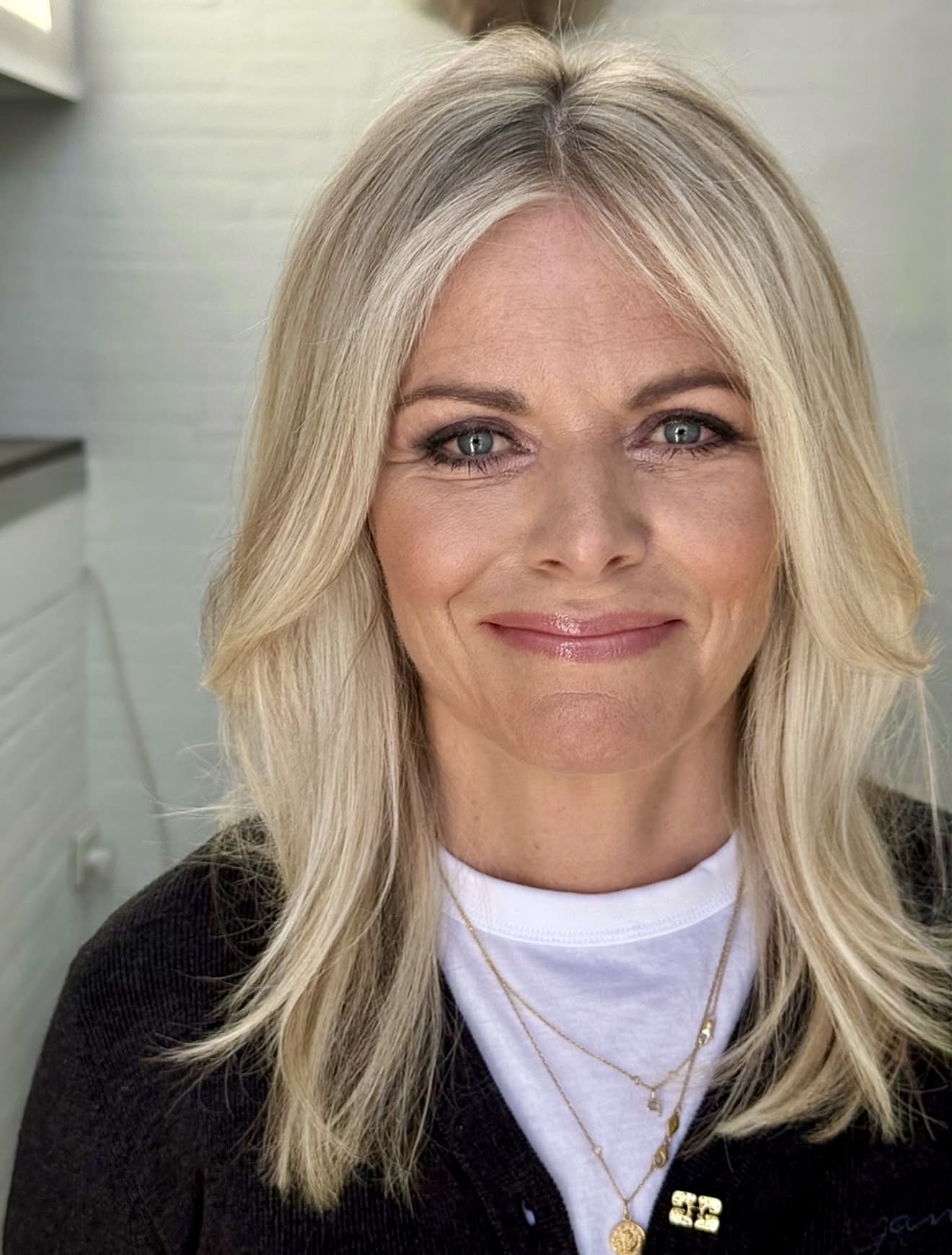 Soft Face-Framing Layers For A Modern Blonde Lob
