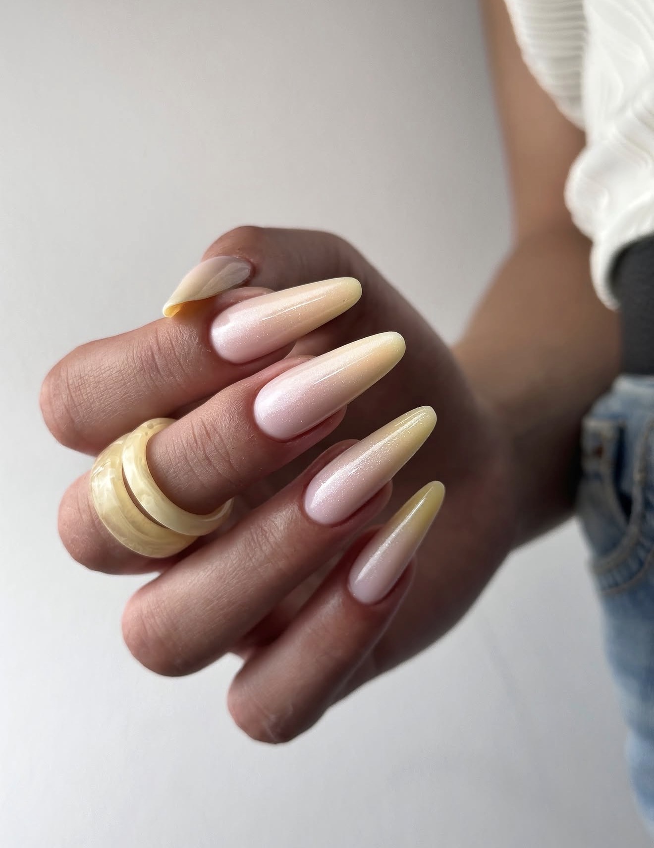 Soft Pink To Yellow Shimmer Ombre Almond Nails