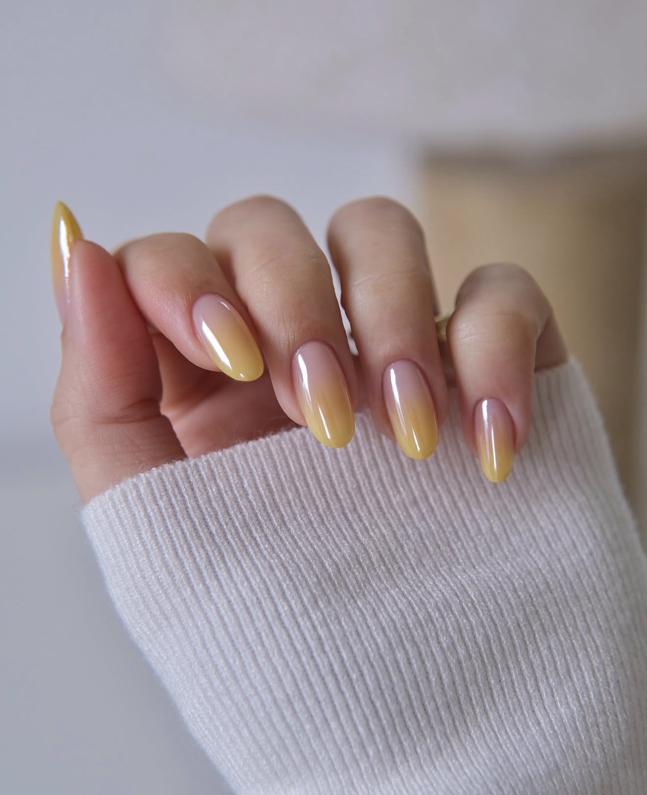 Soft Yellow and Pink Ombre Almond Nails