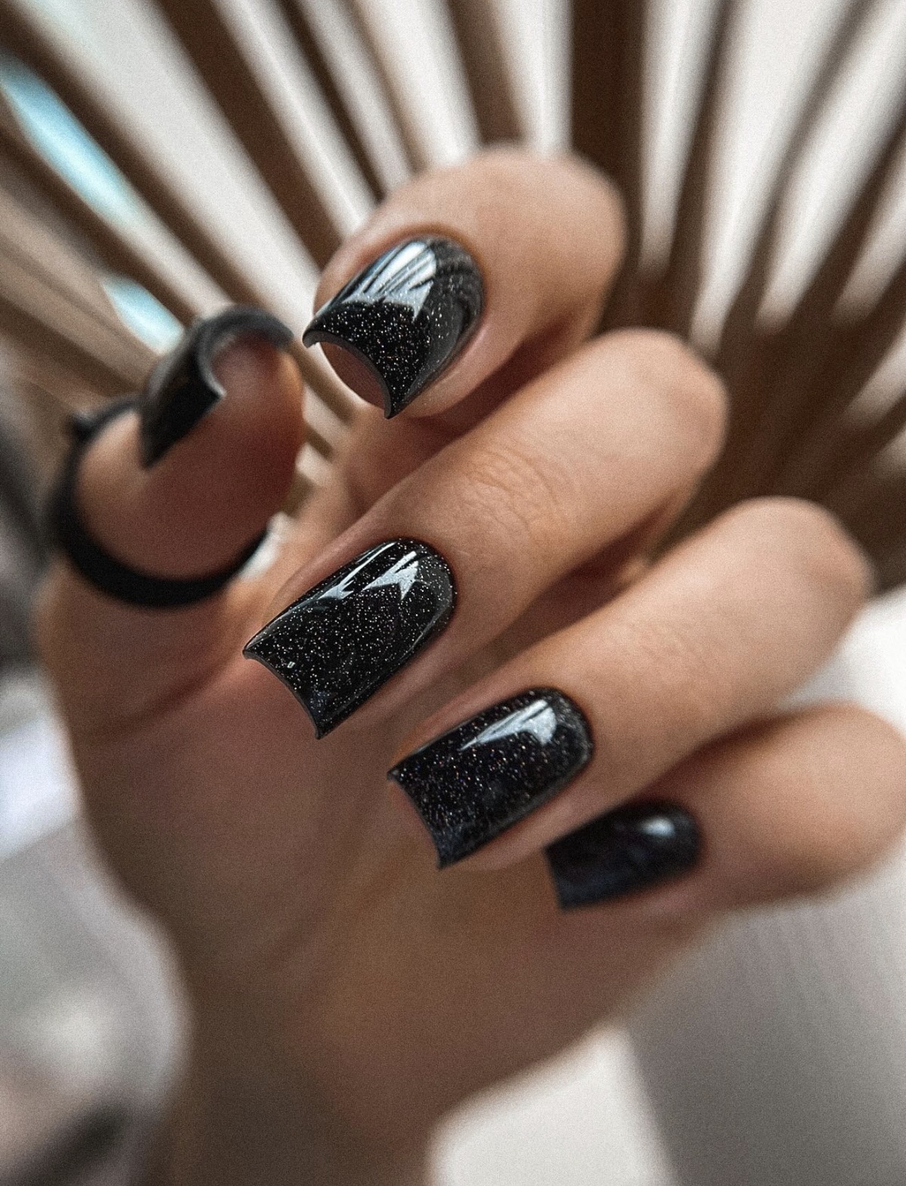 Sparkling Black Galaxy Almond Nails