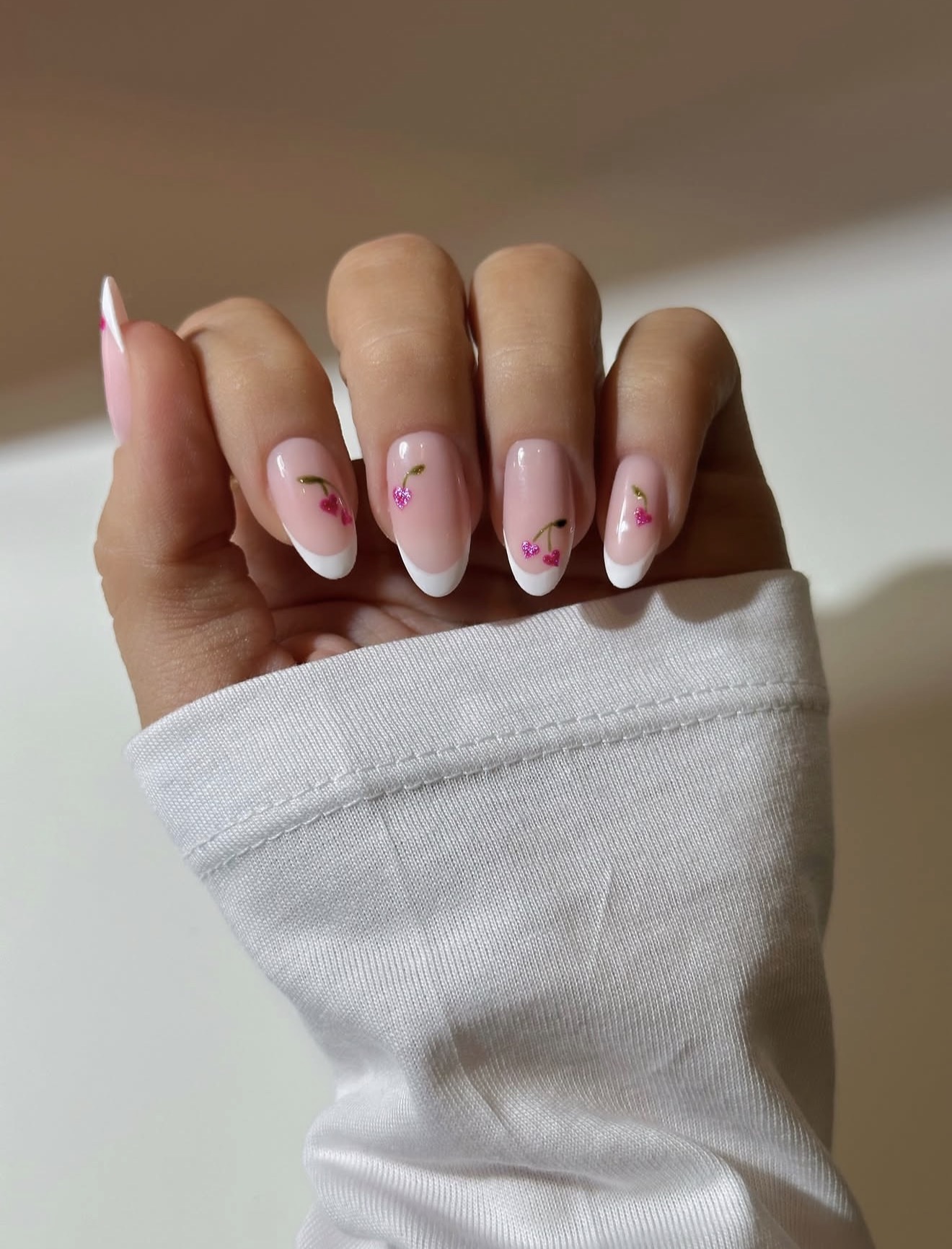 Sparkly Cherry French Almond Nails