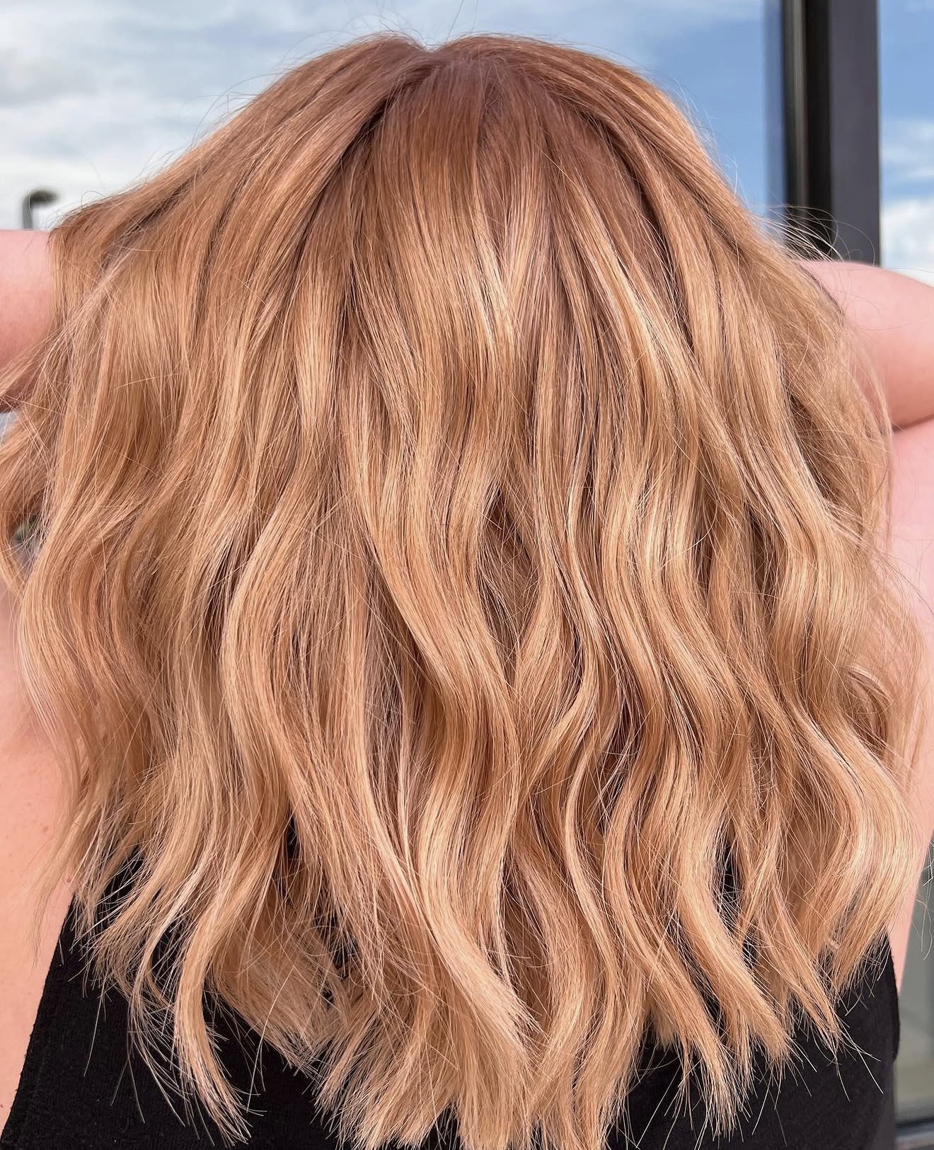 Strawberry Blonde Beach Waves With Subtle Highlights