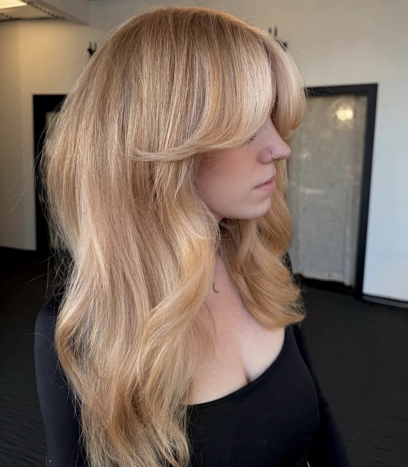 Strawberry Blonde Hair With Voluminous Curtain Bangs